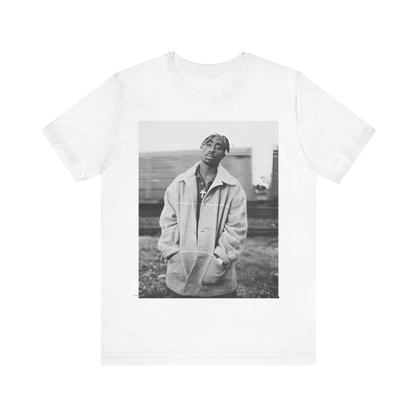 A black graphic t-shirt featuring a graphic related to Tupac's 'Thug Life' philosophy.
