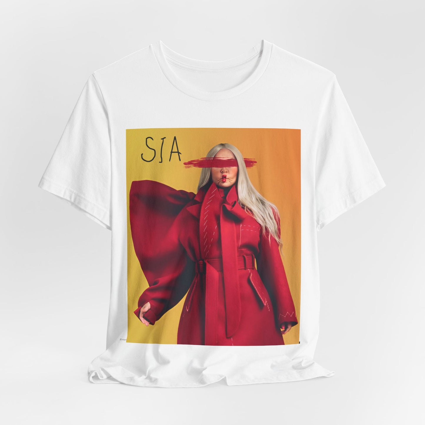 A black graphic t-shirt featuring a retro graphic related to Sia's '1000 Forms of Fear' album era.