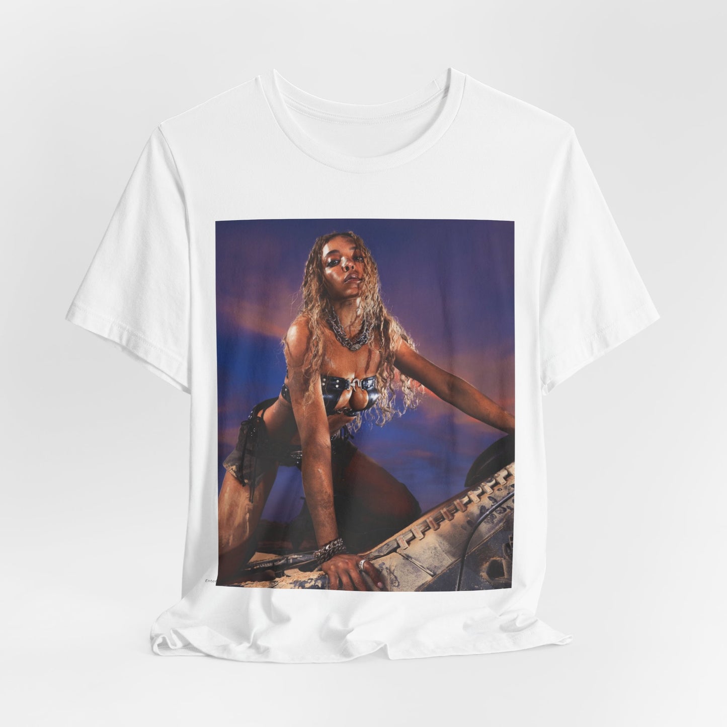 A black graphic t-shirt featuring a vintage graphic related to Tinashe's 'Nasty' era.