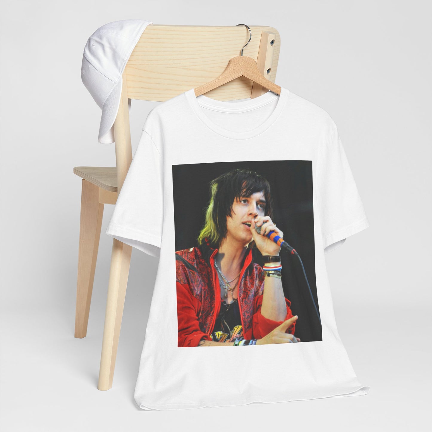 A black graphic t-shirt featuring a vintage indie rock graphic of The Strokes.