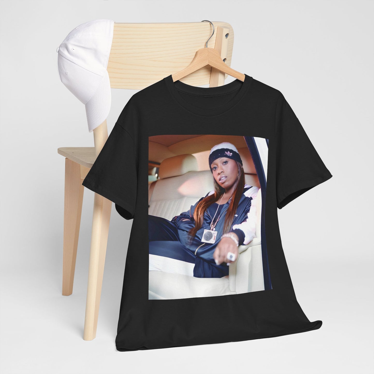 A black graphic t-shirt featuring a casual hip hop fan graphic of Missy Elliott.