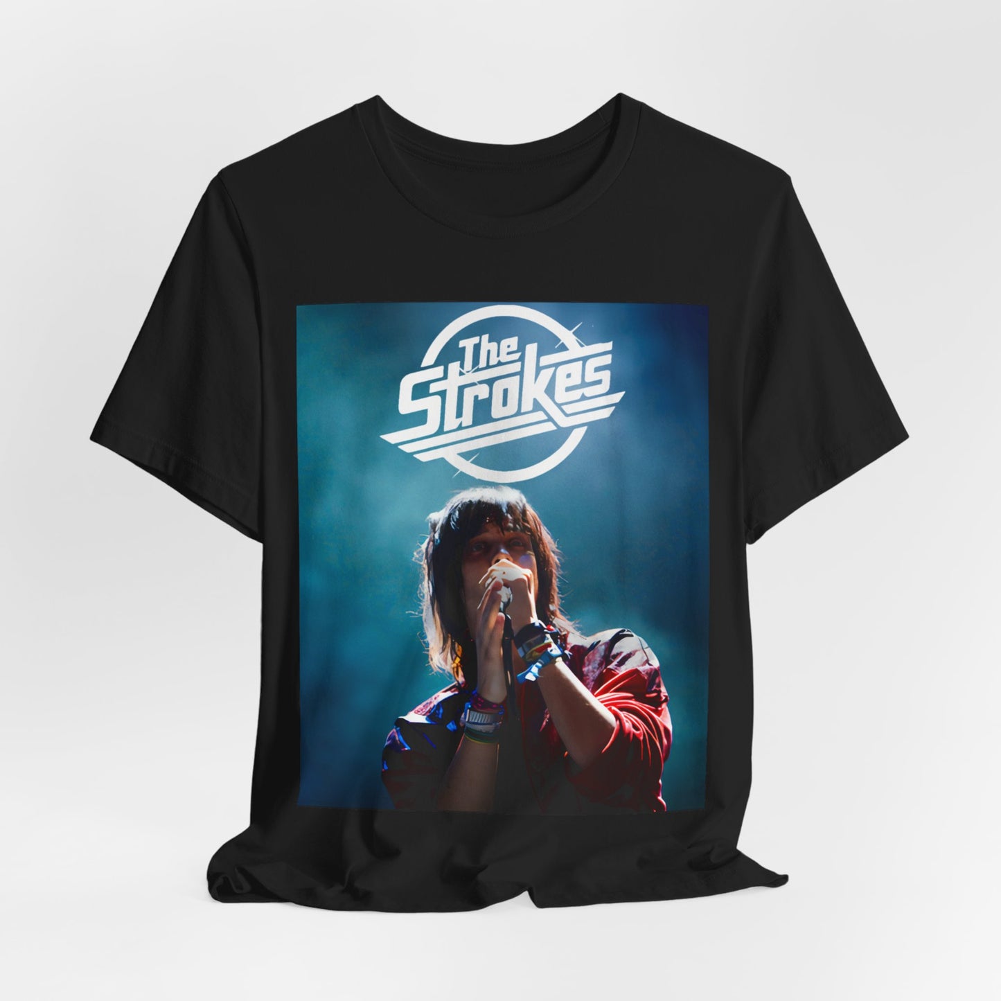 A black graphic t-shirt featuring a portrait or graphic of Julian Casablancas from The Strokes.