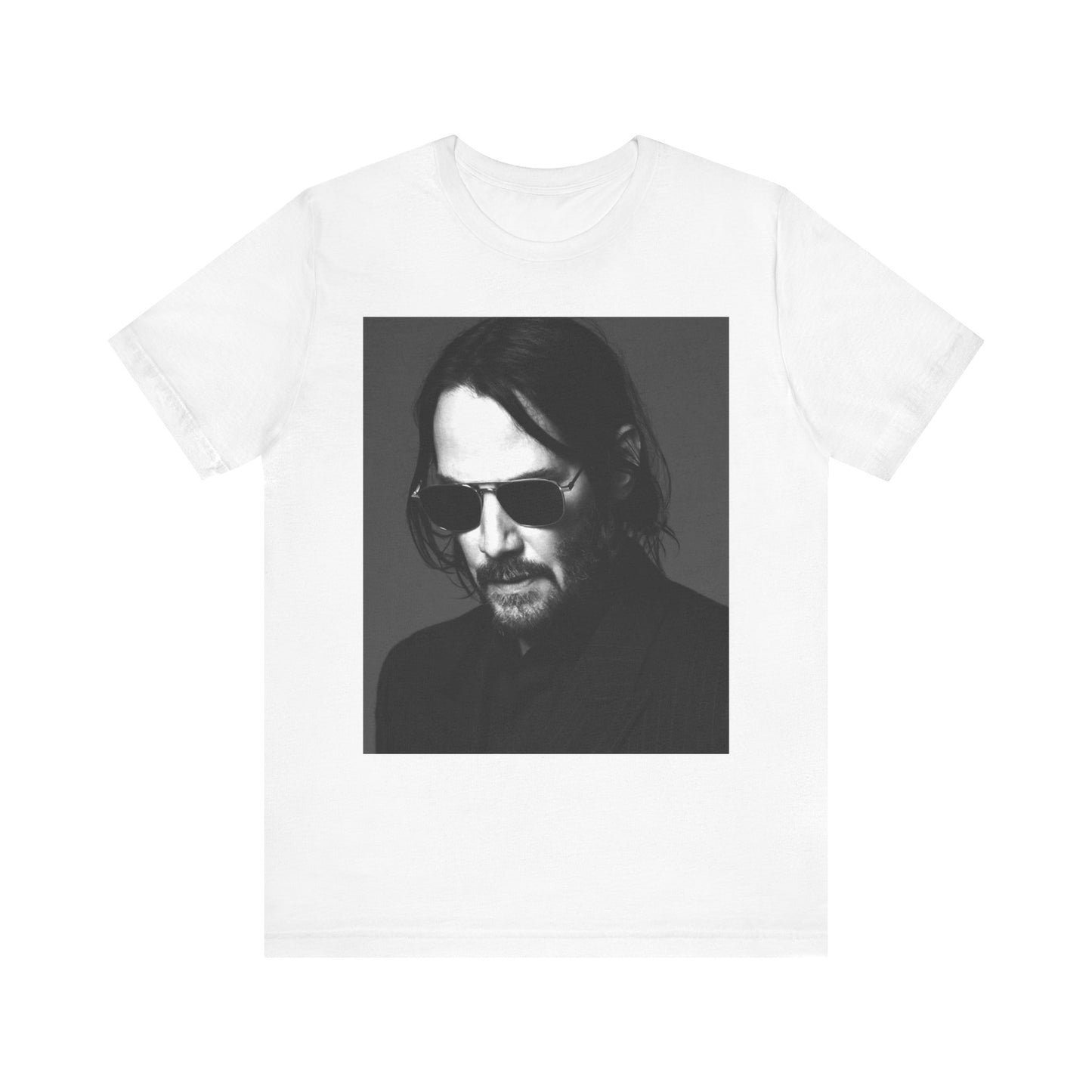 A black graphic t-shirt featuring a graphic of Keanu Reeves with a rebel spirit aesthetic.
