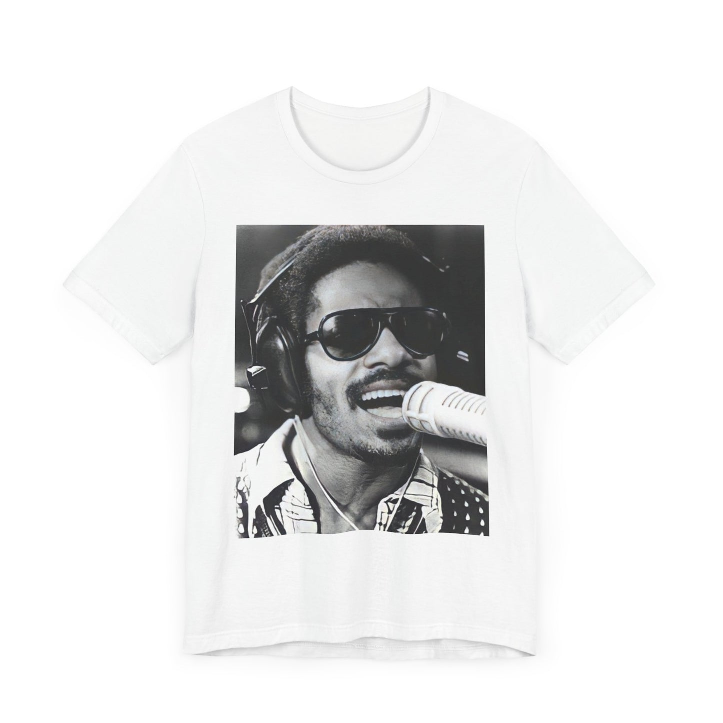 A black graphic t-shirt featuring a graphic of Stevie Wonder as a timeless visionary.