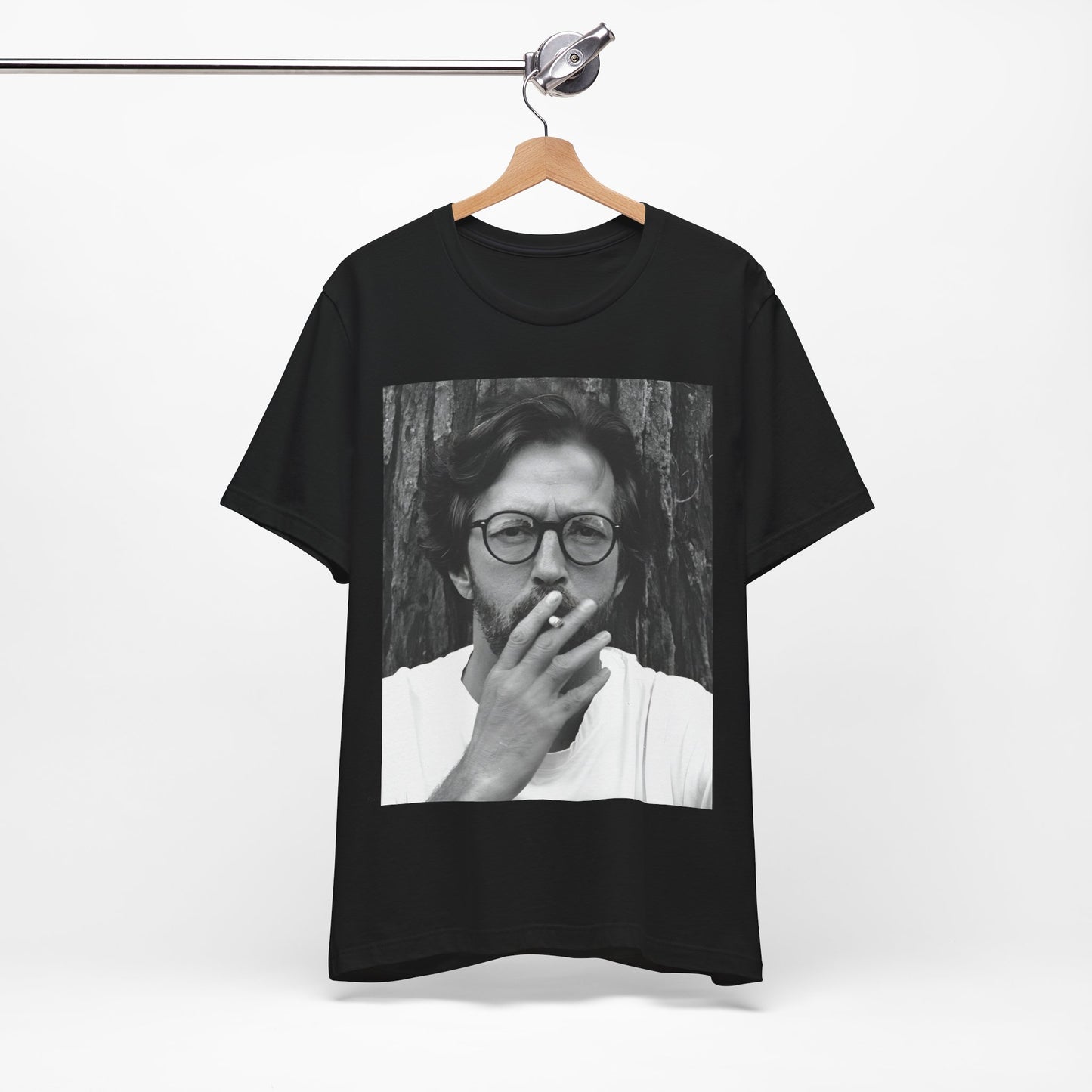A black graphic t-shirt featuring a graphic related to Eric Clapton's classic Cream era.