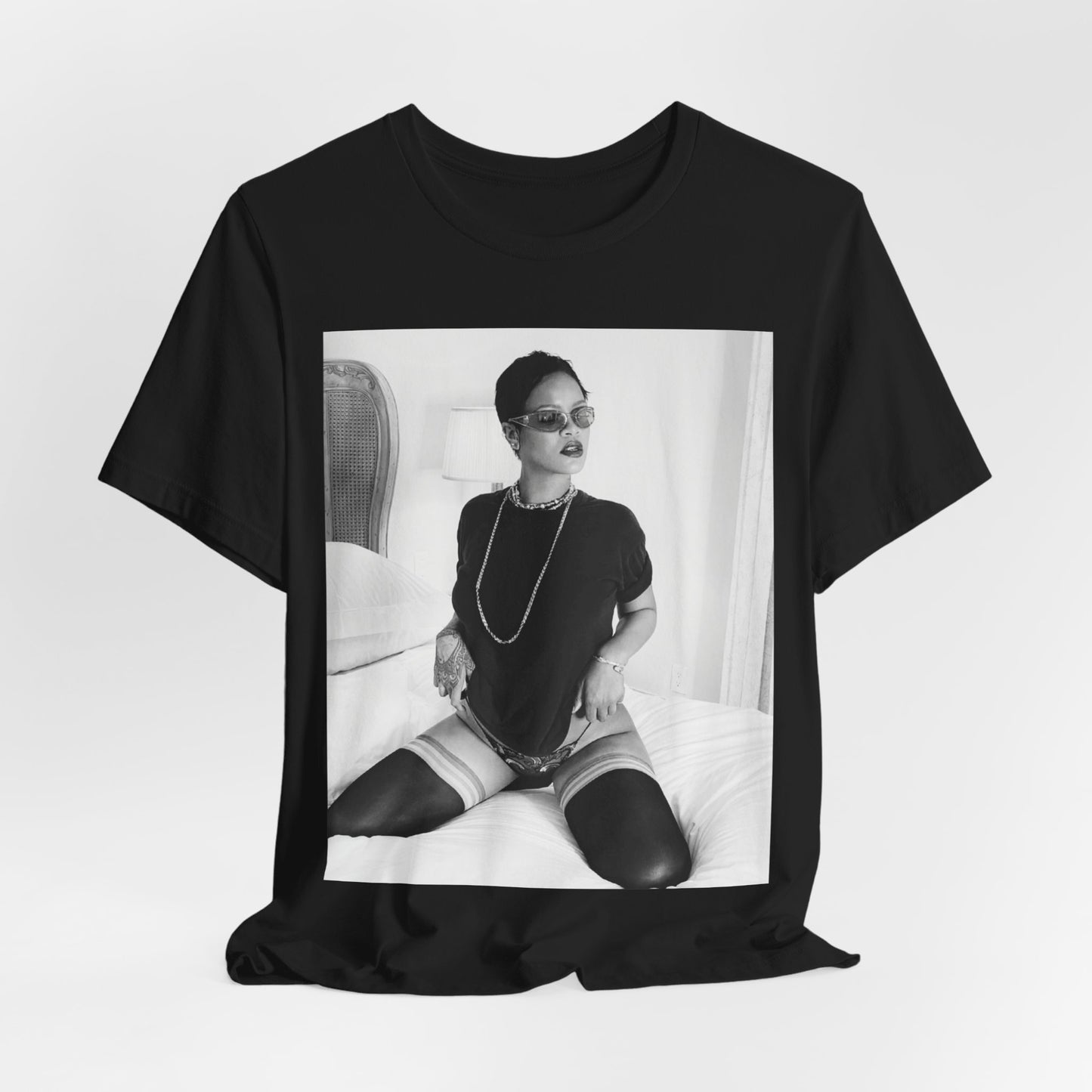 A black graphic t-shirt featuring a black and white graphic related to Rihanna's 'Diamonds' song or era.