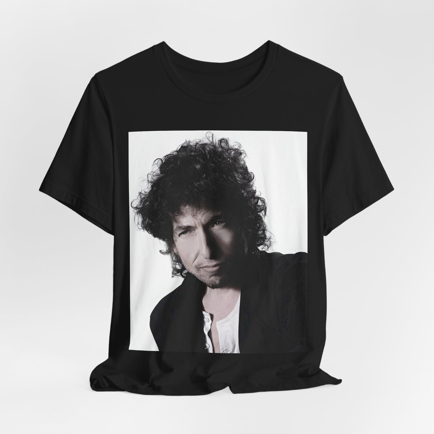 A black graphic t-shirt featuring a timeless folk rock graphic of Bob Dylan, possibly with his guitar or harmonica.