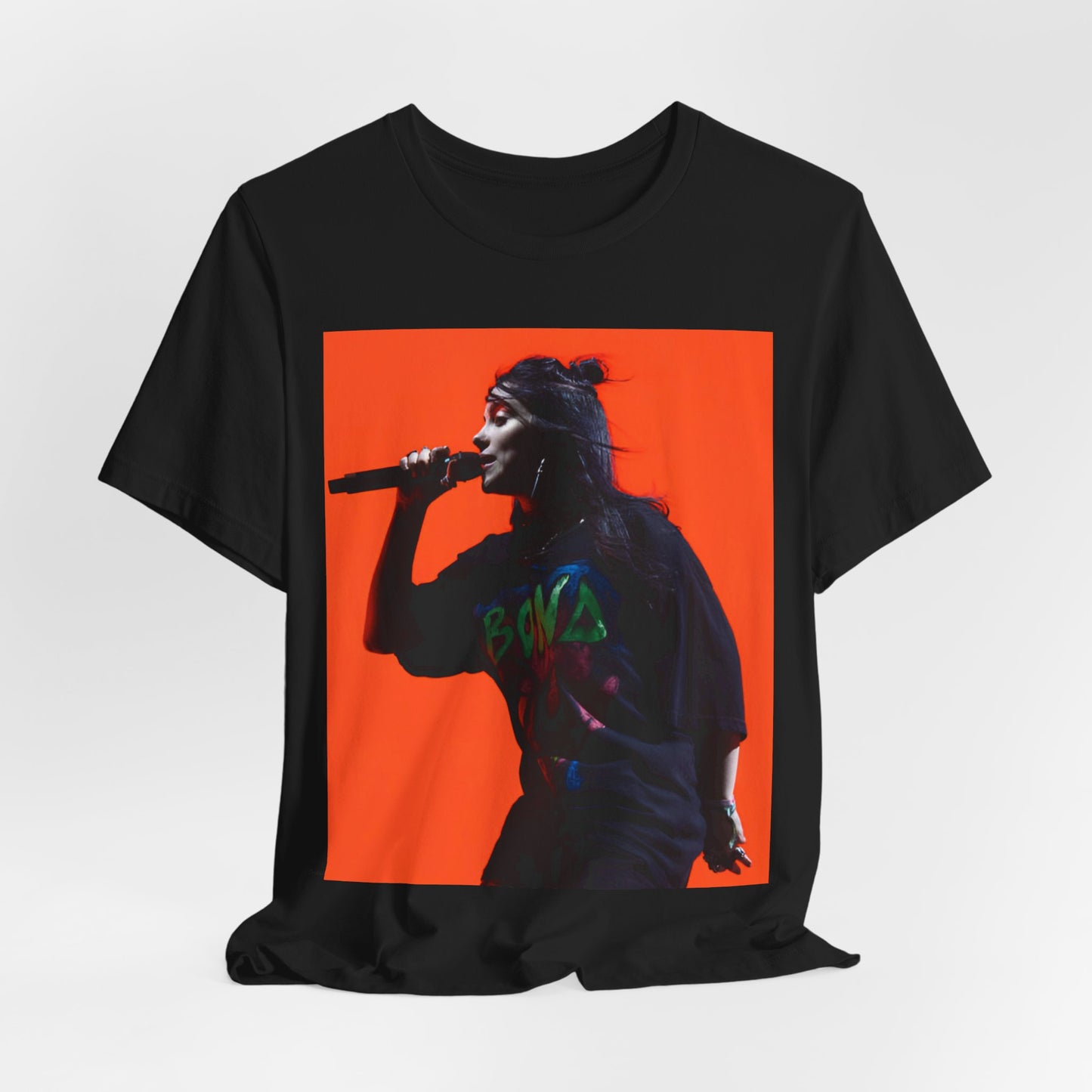 The official 'Blohsh' stick figure logo of Billie Eilish, printed in a single color on a graphic t-shirt.