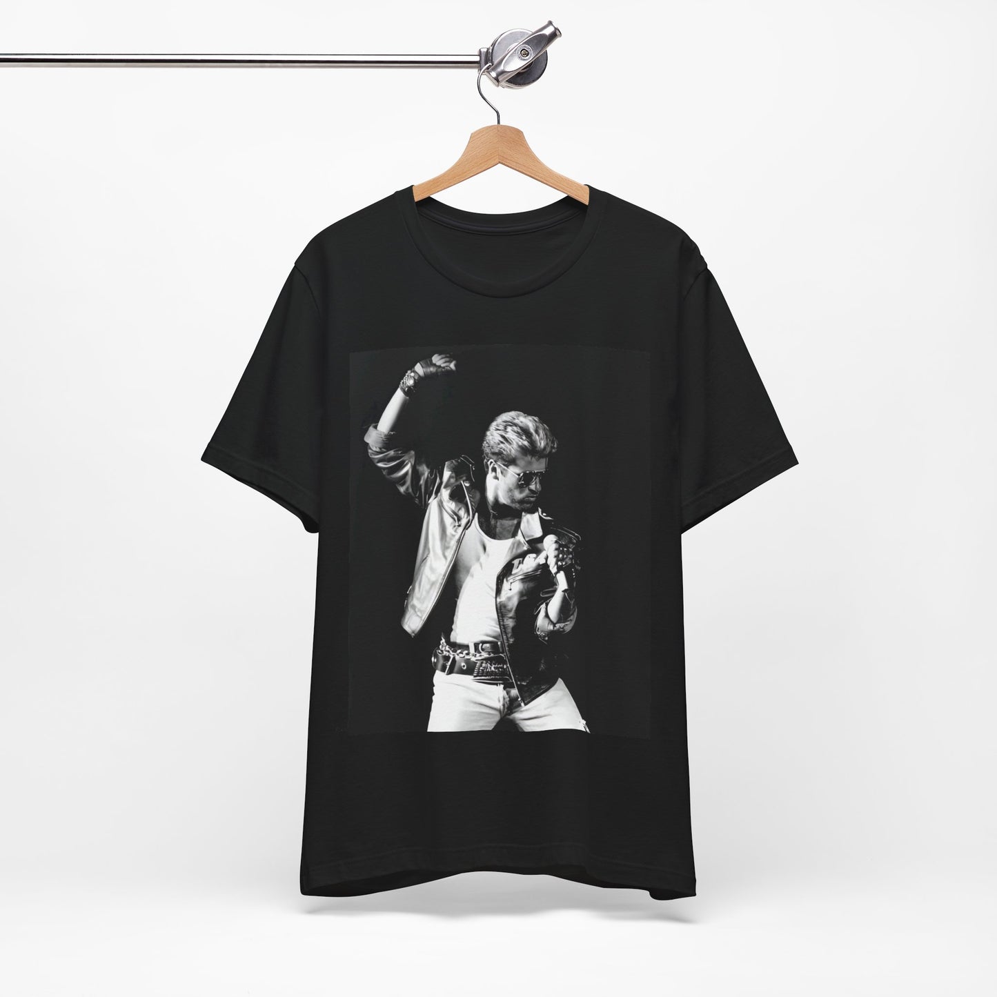 A black graphic t-shirt featuring an iconic black and white portrait photo of George Michael.