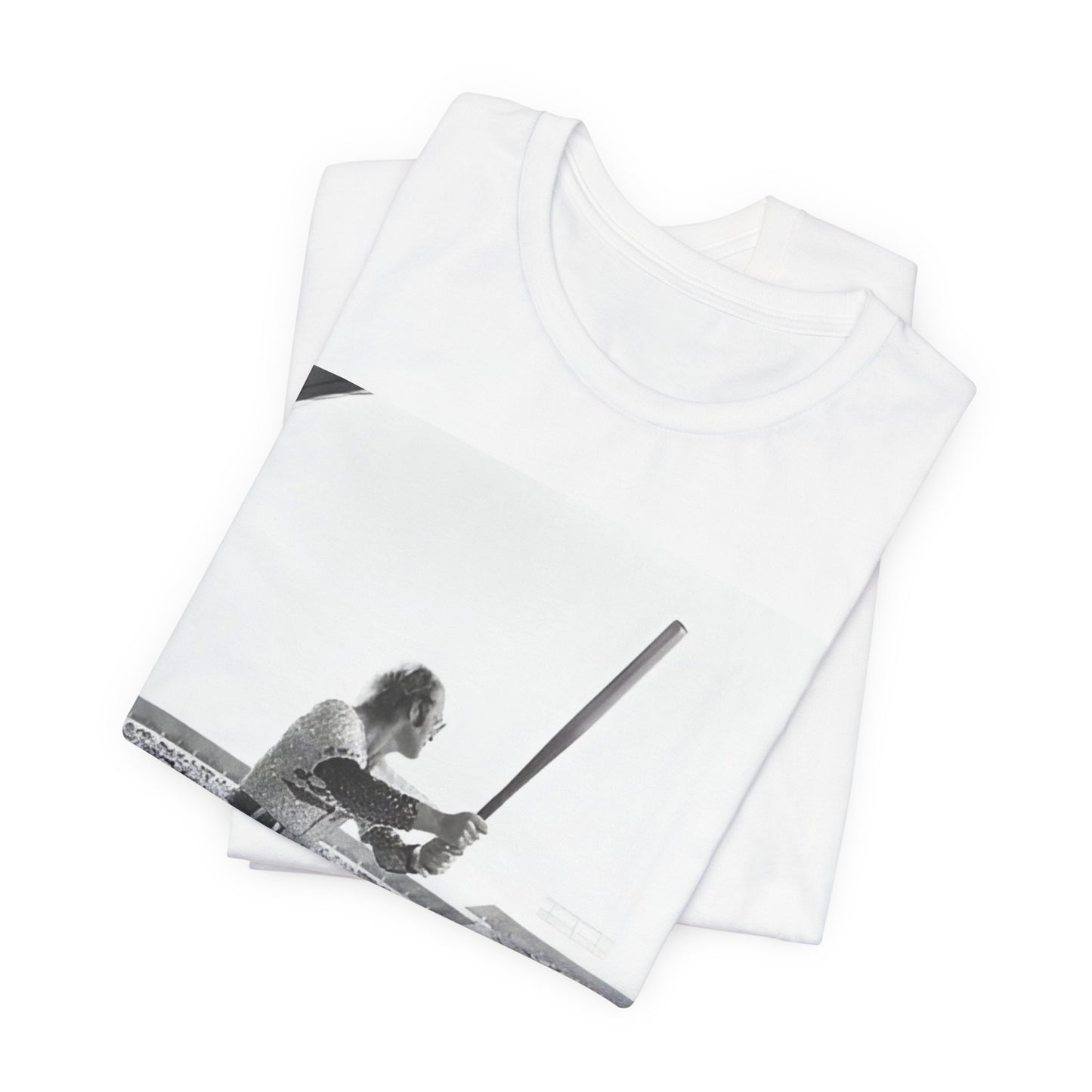 A black graphic t-shirt featuring a black and white graphic or photo related to Elton John's 1975 tour in America.