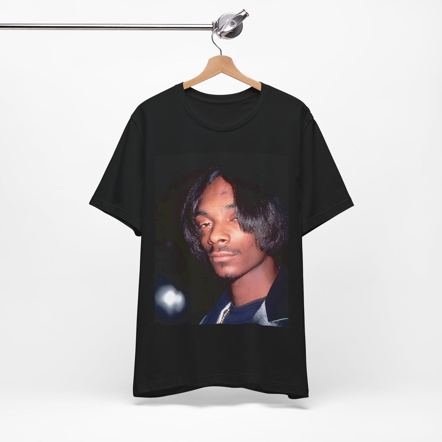 A black graphic t-shirt featuring a 90s black and white graphic of Snoop Dogg as a global icon in rap.