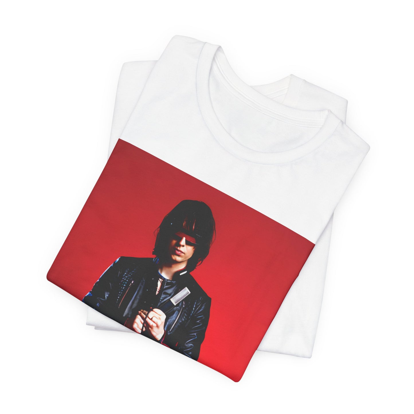 A black graphic t-shirt featuring a bold indie rock superstar graphic of The Strokes.