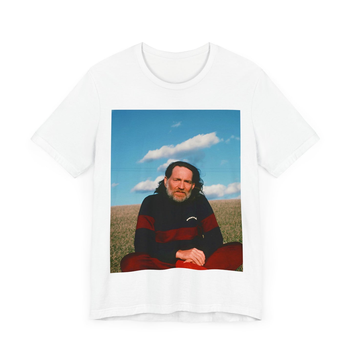A black graphic t-shirt featuring a classic outlaw country graphic of Willie Nelson.