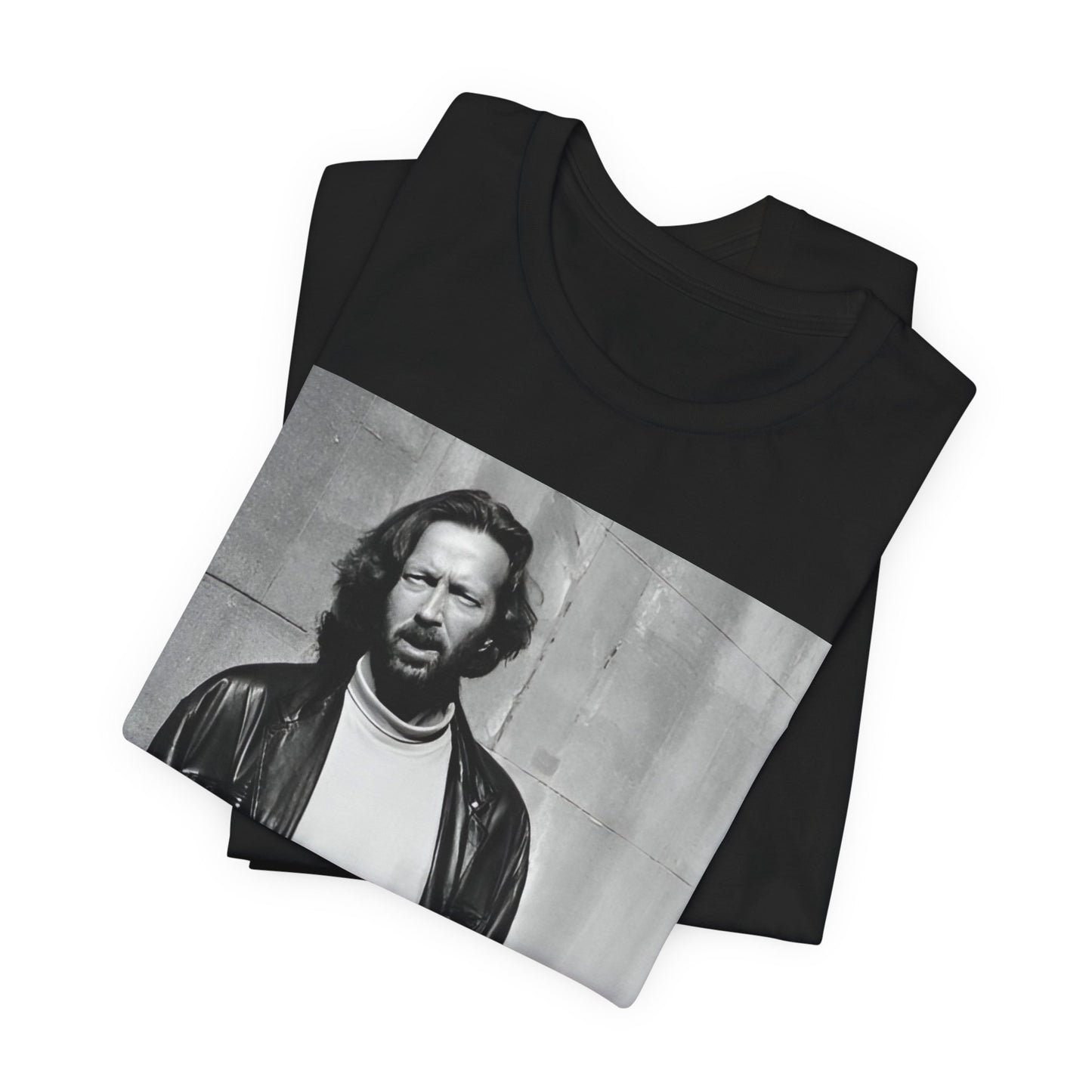 A black graphic t-shirt featuring a retro graphic related to Eric Clapton's 'Cocaine' song or era.