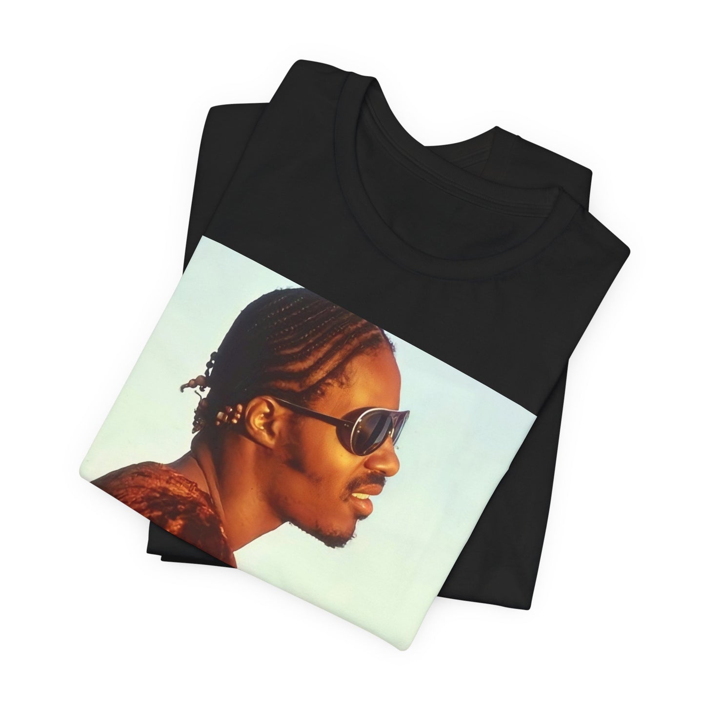A black graphic t-shirt featuring a graphic of Stevie Wonder as an iconic style pop innovator.