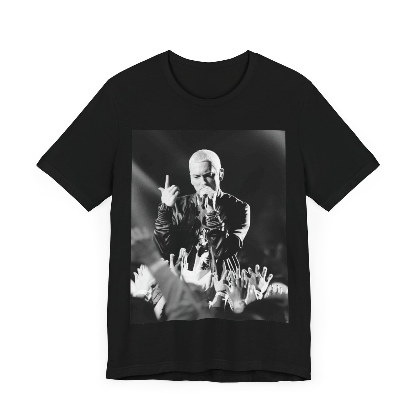 A black graphic t-shirt featuring a graphic or photo of Eminem performing live on stage.