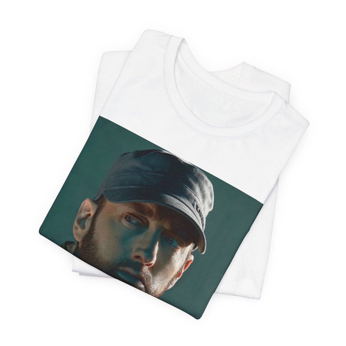 A black graphic t-shirt featuring a graphic of Eminem as a rap genius.