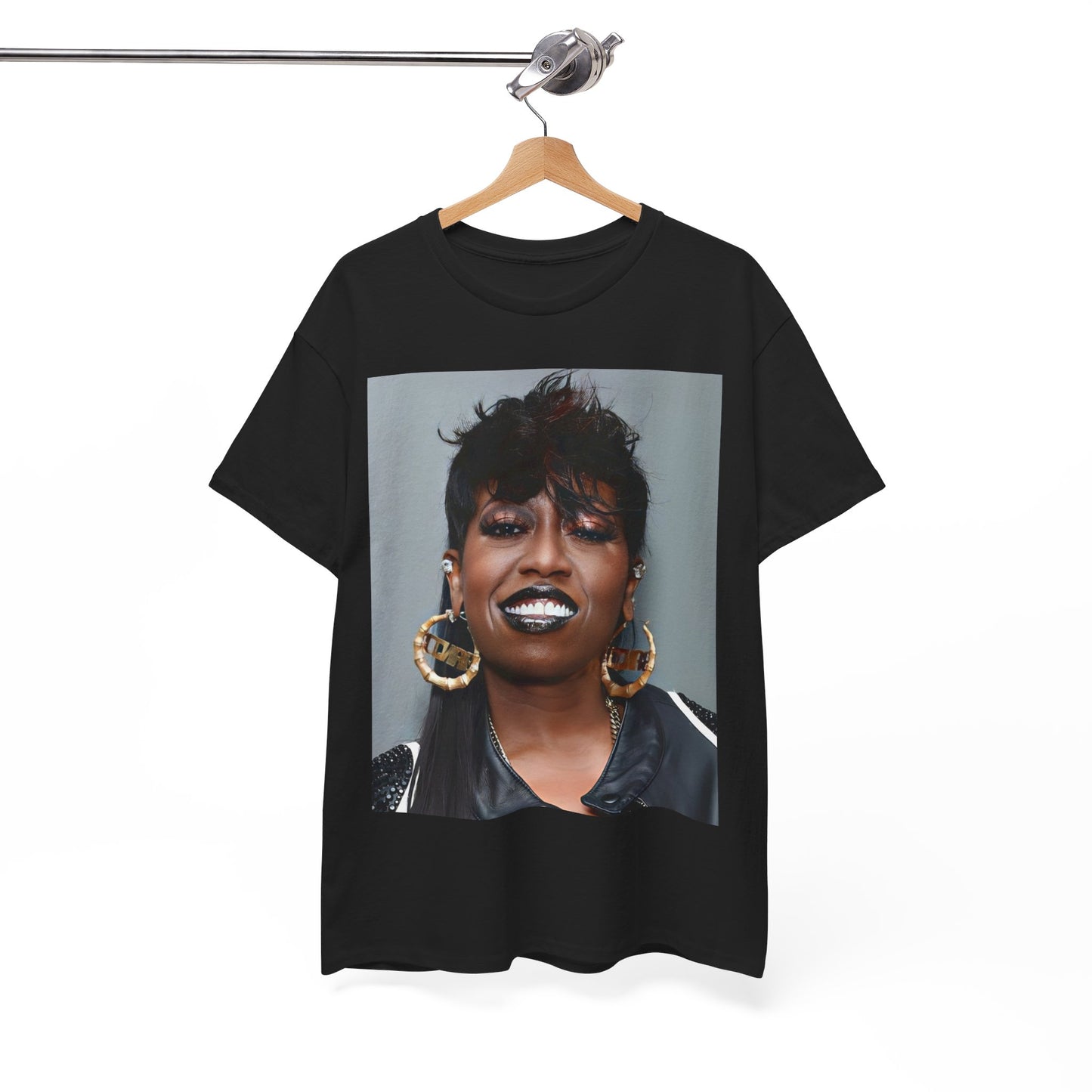 A black graphic t-shirt featuring a bold graphic of Missy Elliott as a rap superstar.