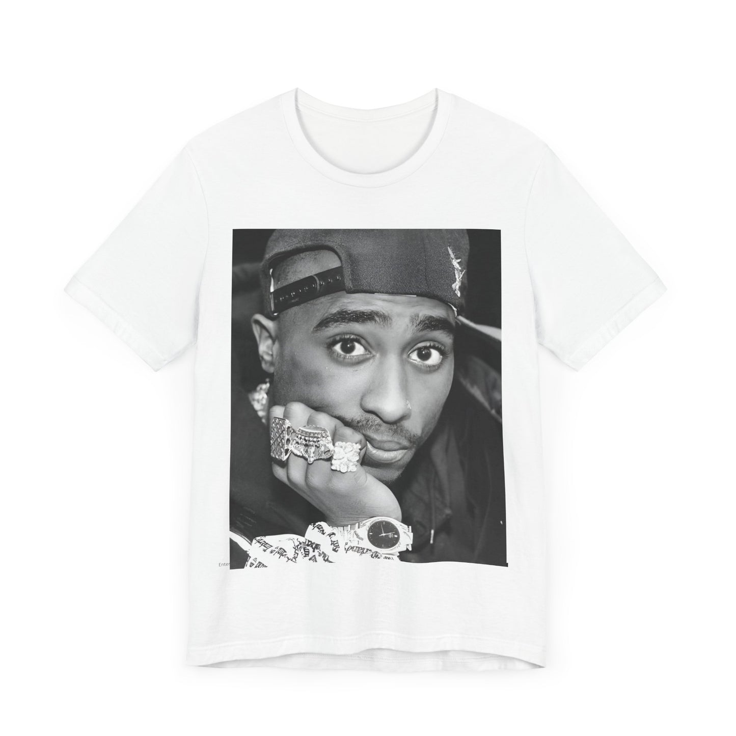 A black graphic t-shirt featuring a bold graphic of Tupac as a rap superstar.