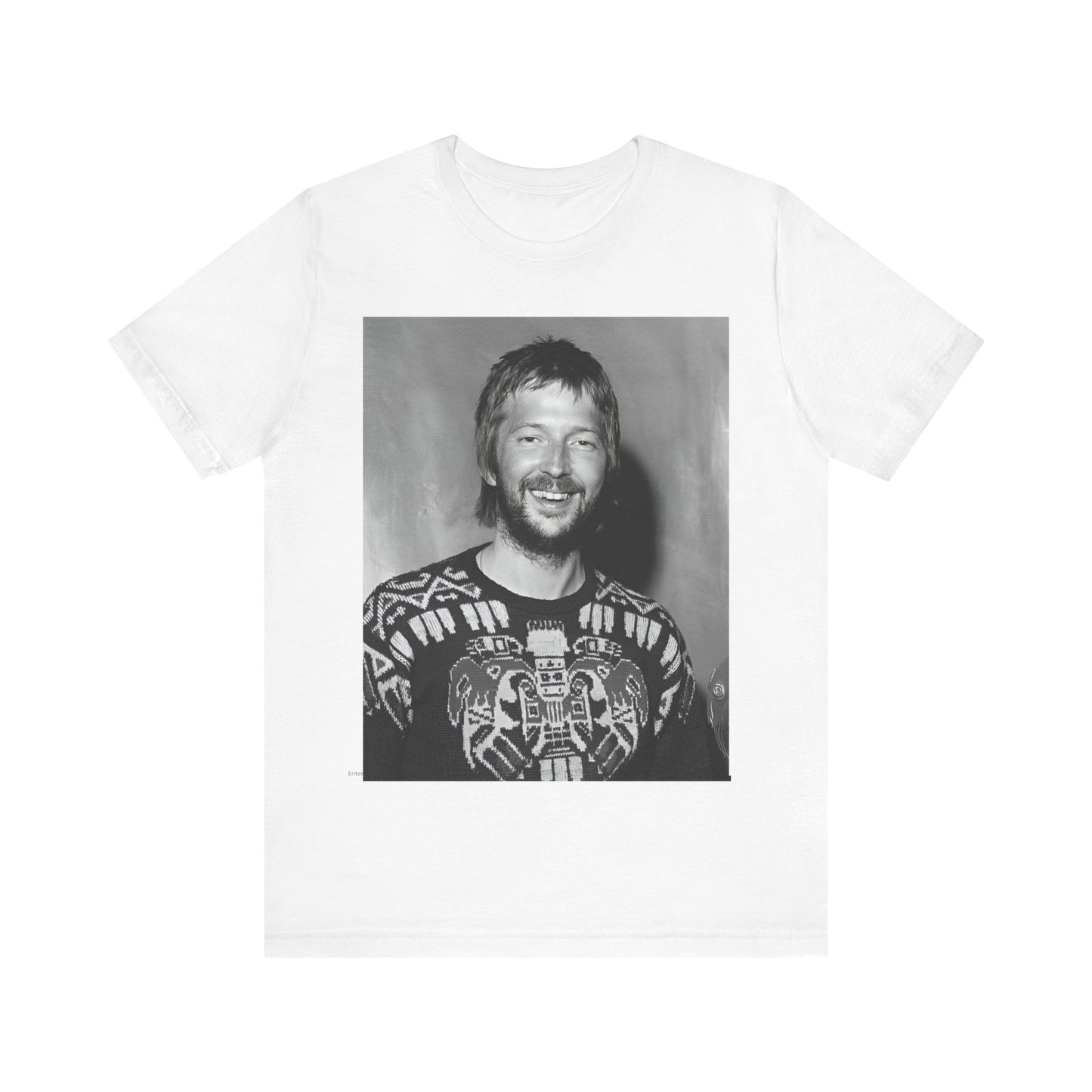 A black graphic t-shirt featuring a 70s photo portrait of Eric Clapton.