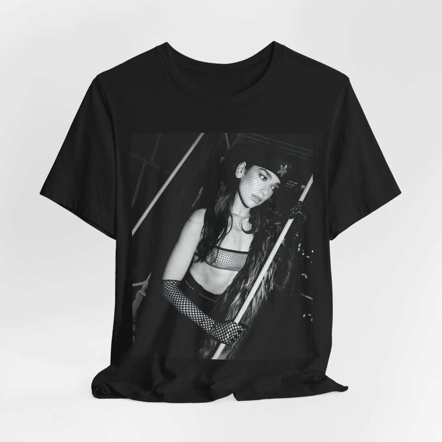 A black graphic t-shirt featuring a black and white, monochrome graphic or portrait of Dua Lipa.