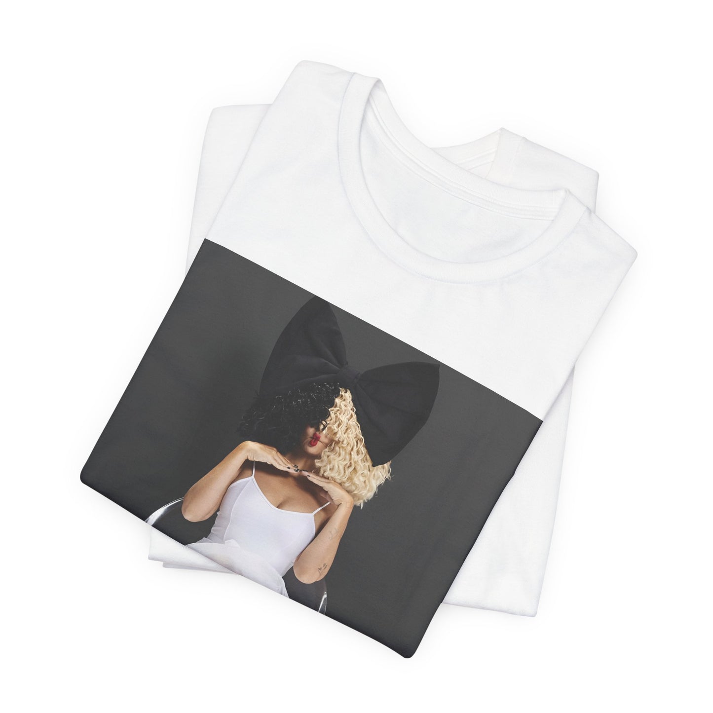 A black graphic t-shirt featuring a graphic of Sia's iconic wig style.