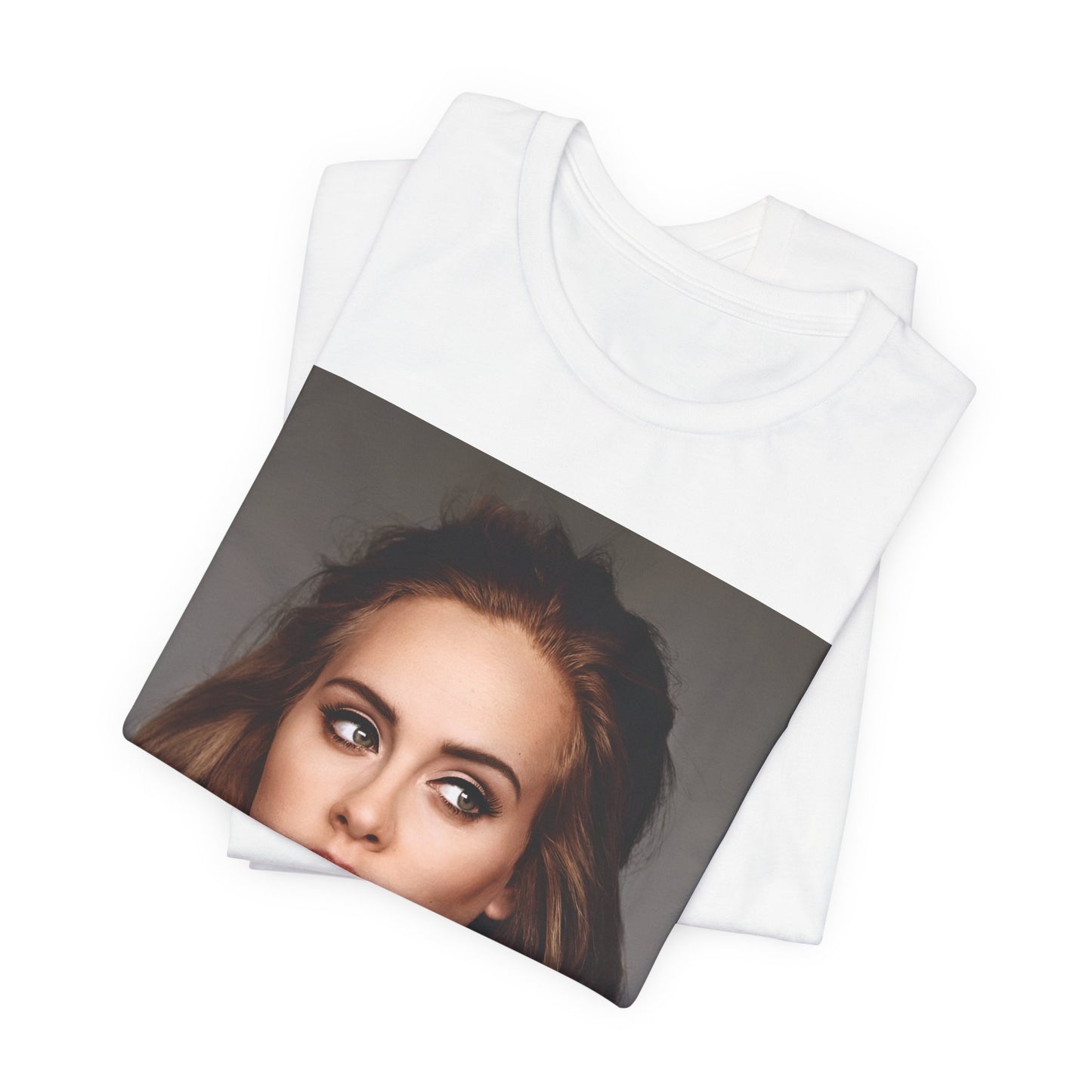 A black graphic t-shirt featuring a studio portrait of Adele from her '25' album era, showing a thoughtful or serene expression.