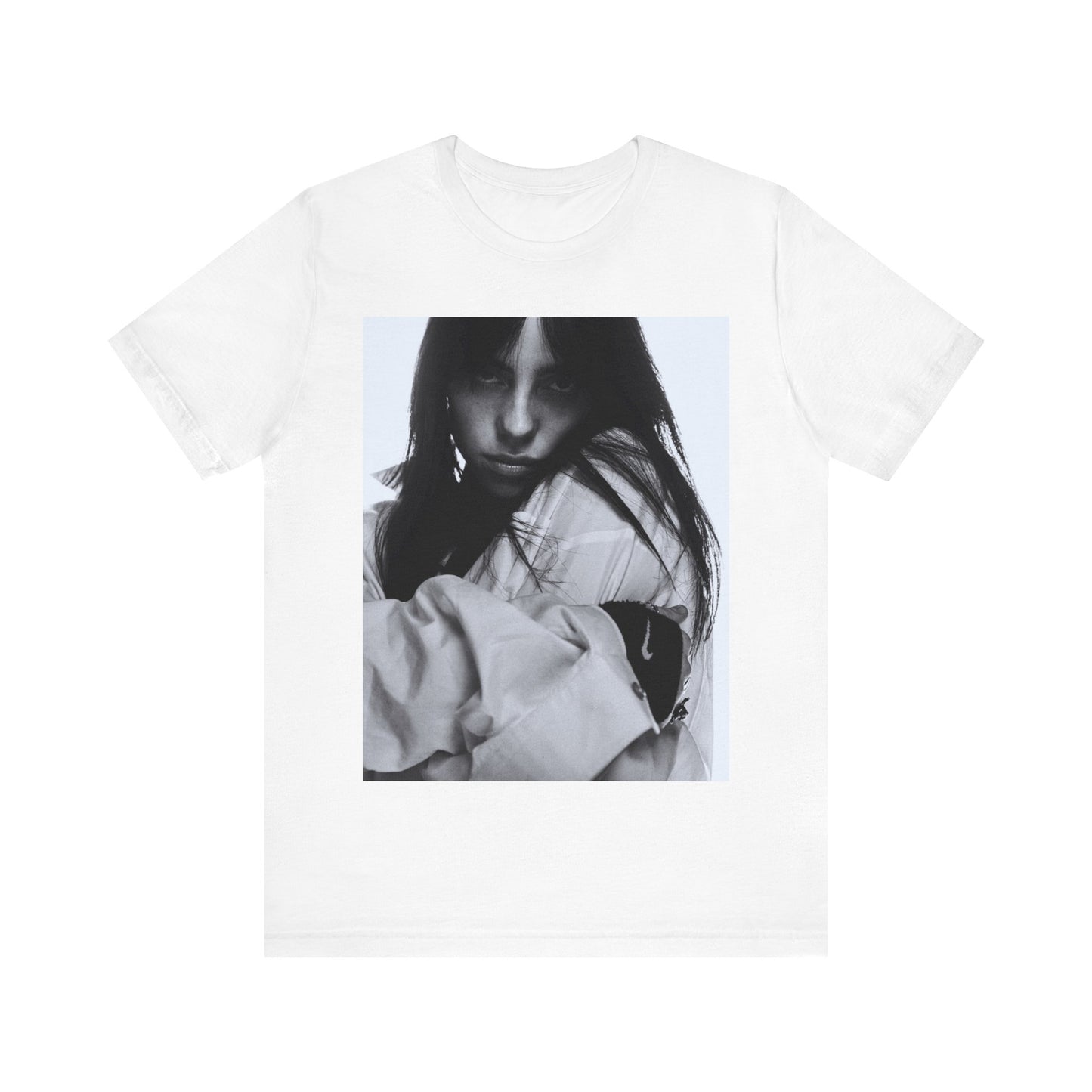 Billie Eilish posing in her signature oversized designer streetwear, printed on a graphic t-shirt.