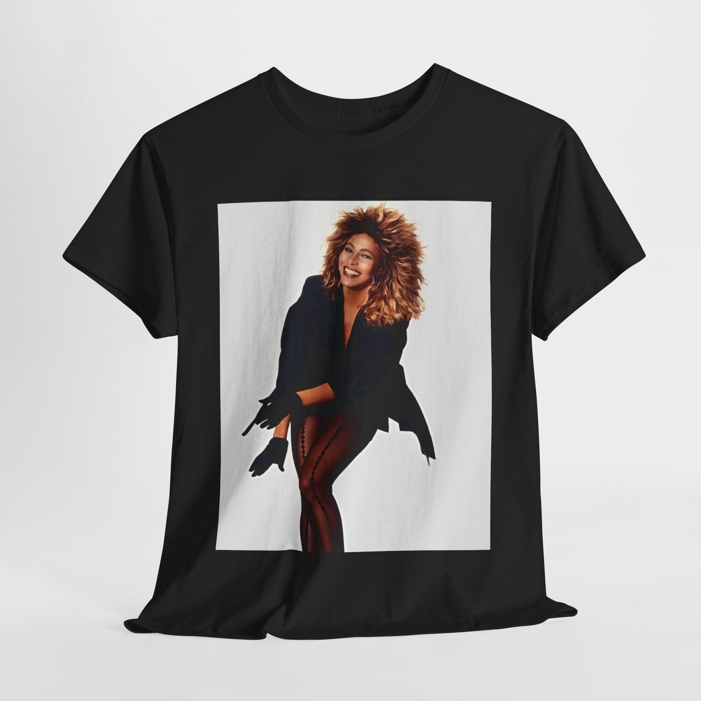 A black graphic t-shirt featuring a graphic of Tina Turner as a Rock and Roll Hall of Famer.