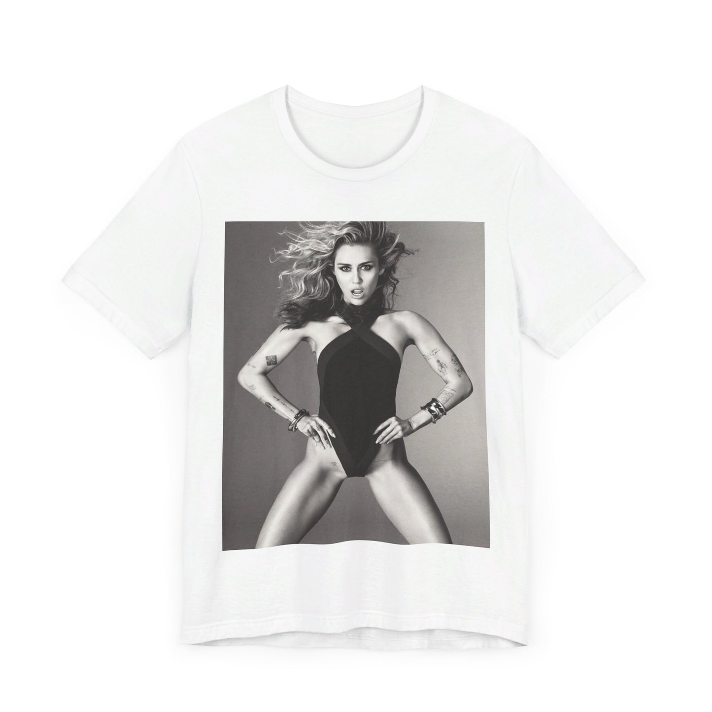 A black graphic t-shirt featuring a bold graphic of Miley Cyrus as a pop superstar.