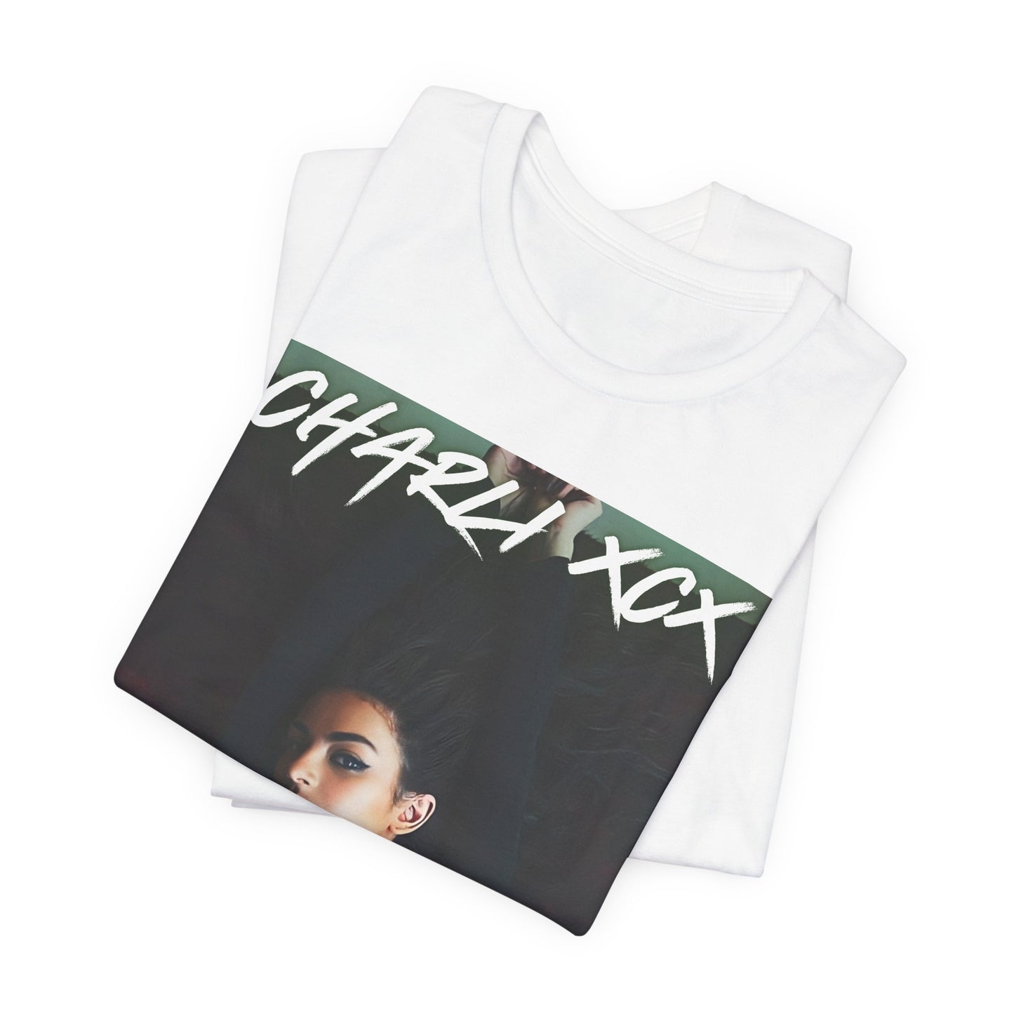 A black graphic t-shirt featuring a graphic of Charli XCX, designed with a future pop diva aesthetic.