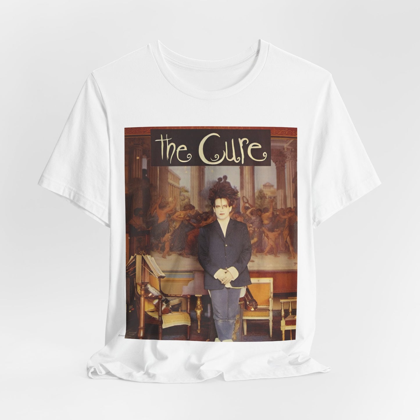A black graphic t-shirt featuring a graphic of Robert Smith from The Cure as a goth icon.