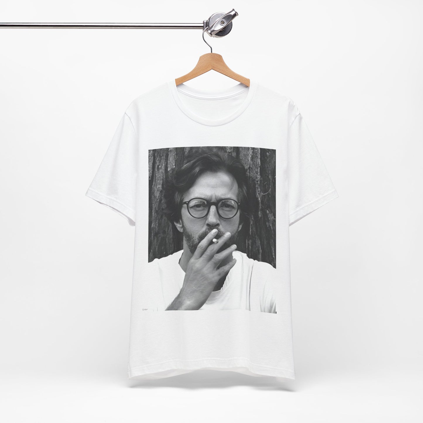 A black graphic t-shirt featuring a graphic related to Eric Clapton's classic Cream era.