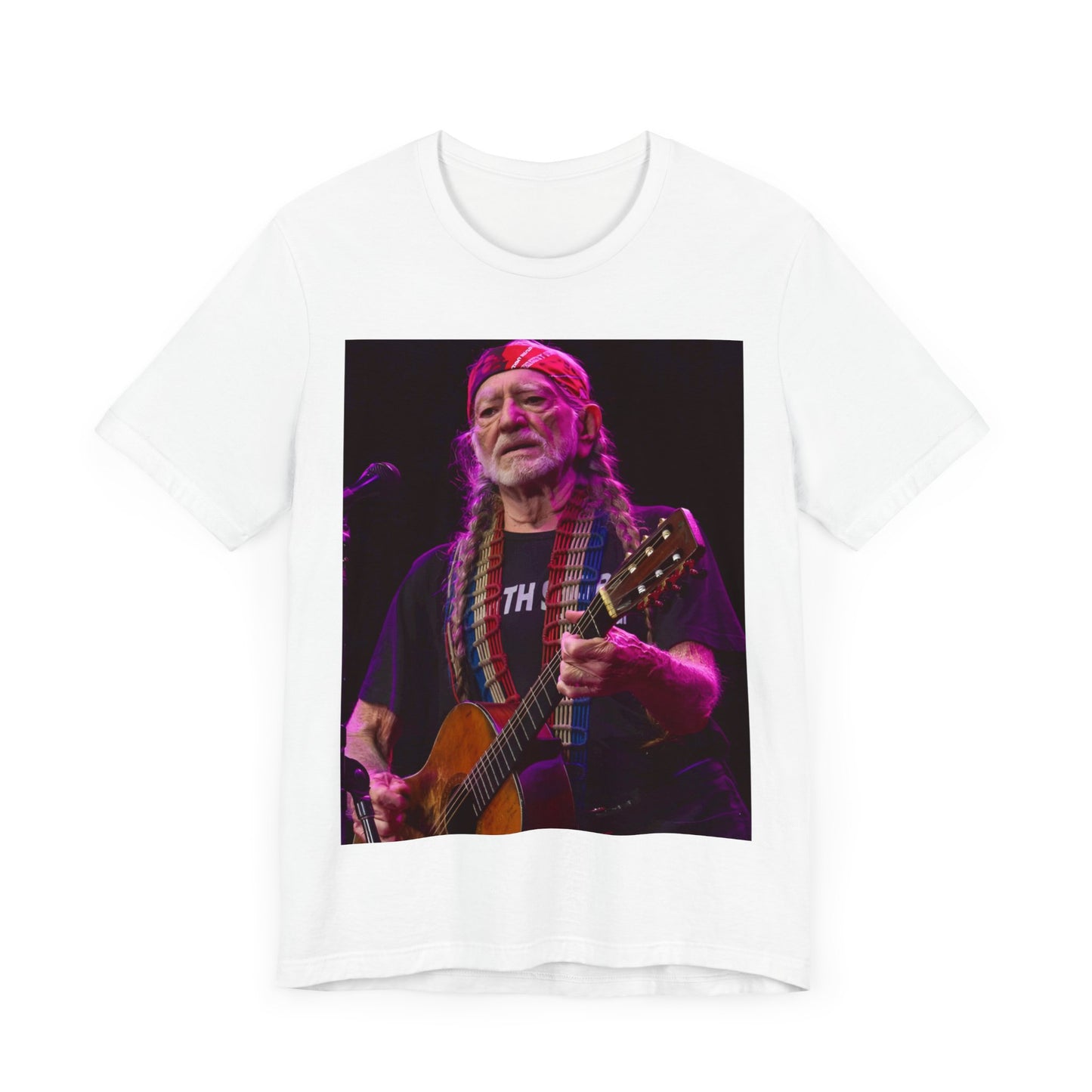 A black graphic t-shirt featuring an outlaw country legend graphic of Willie Nelson.