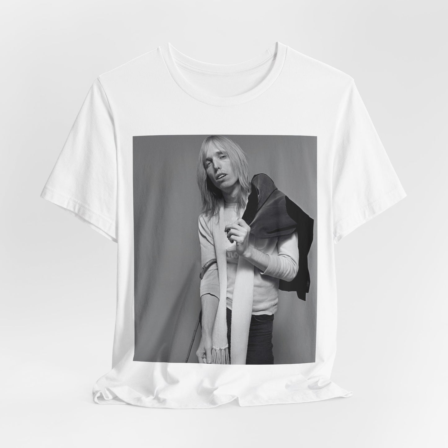 A black graphic t-shirt featuring a modern rock essential graphic of Tom Petty.