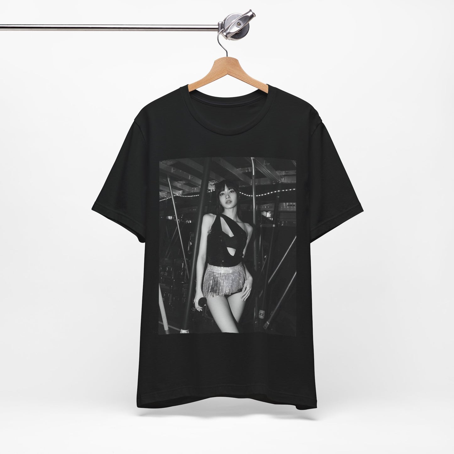 A black graphic t-shirt featuring a black and white graphic or photo of Lisa in a backstage setting.