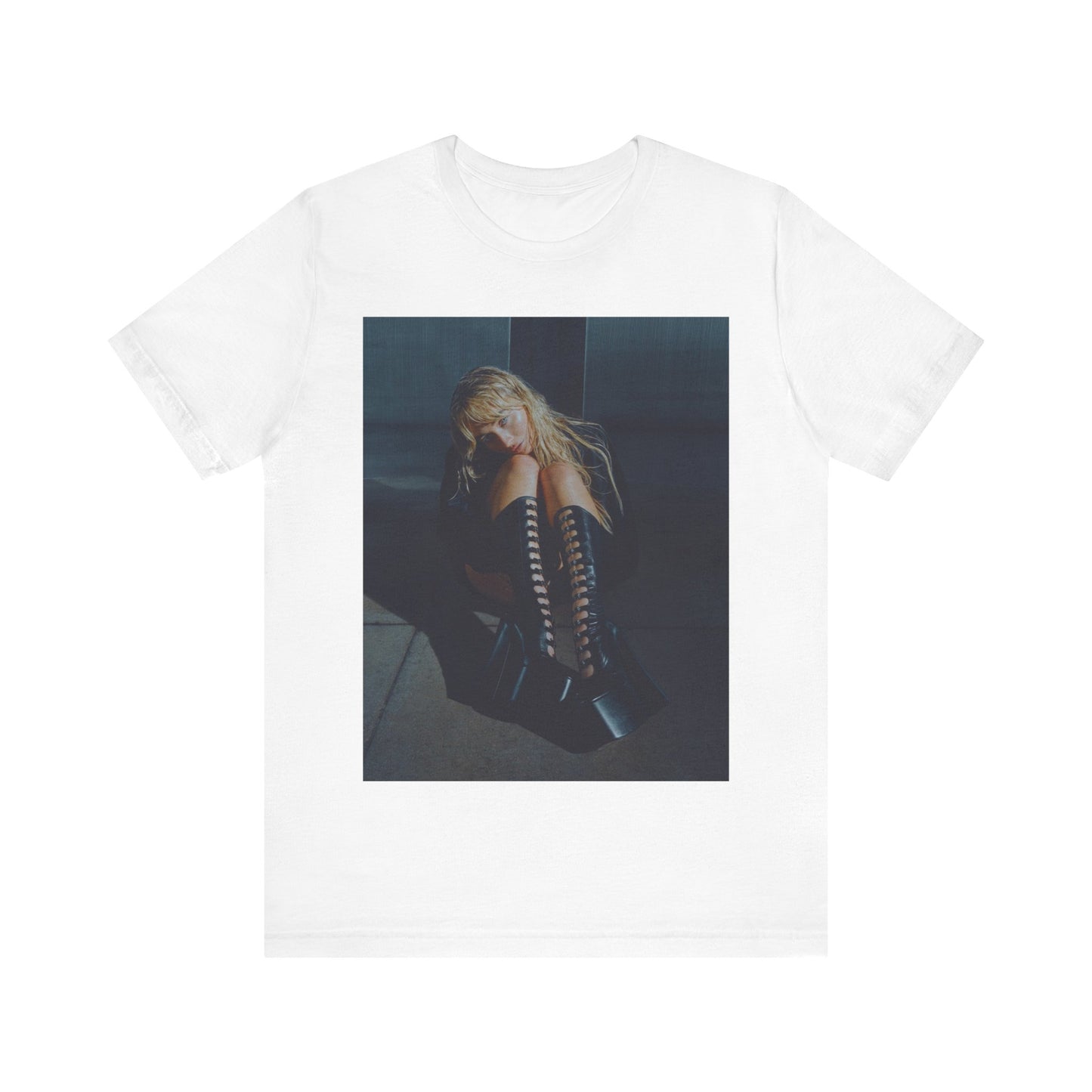 A black graphic t-shirt featuring a bold graphic of Sabrina Carpenter as a pop superstar.