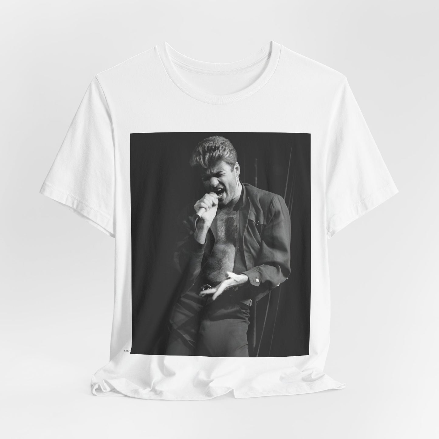 A black graphic t-shirt featuring a glamorous photo or graphic of George Michael performing live.