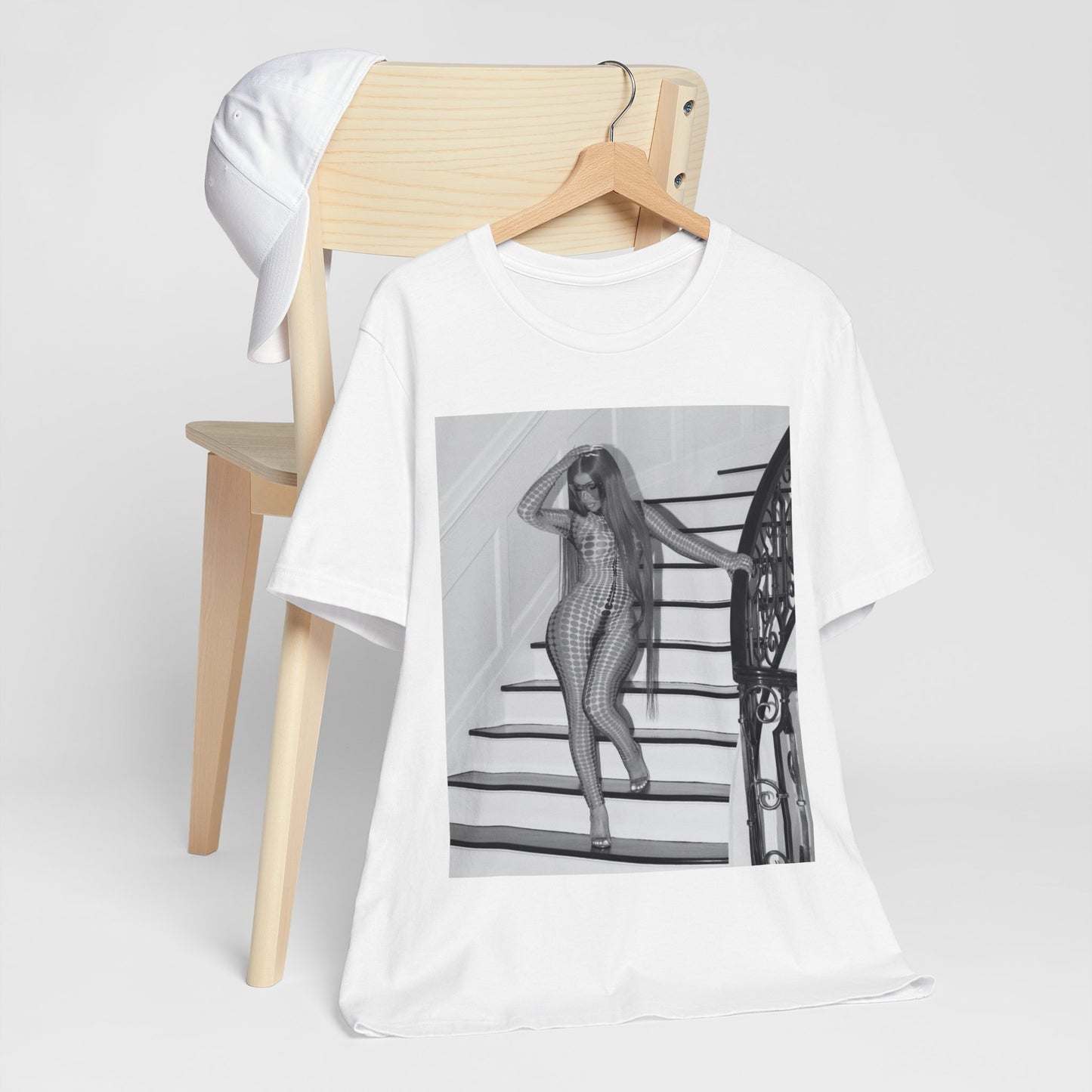 A black graphic t-shirt featuring a graphic of Cardi B as an authentic culture icon.
