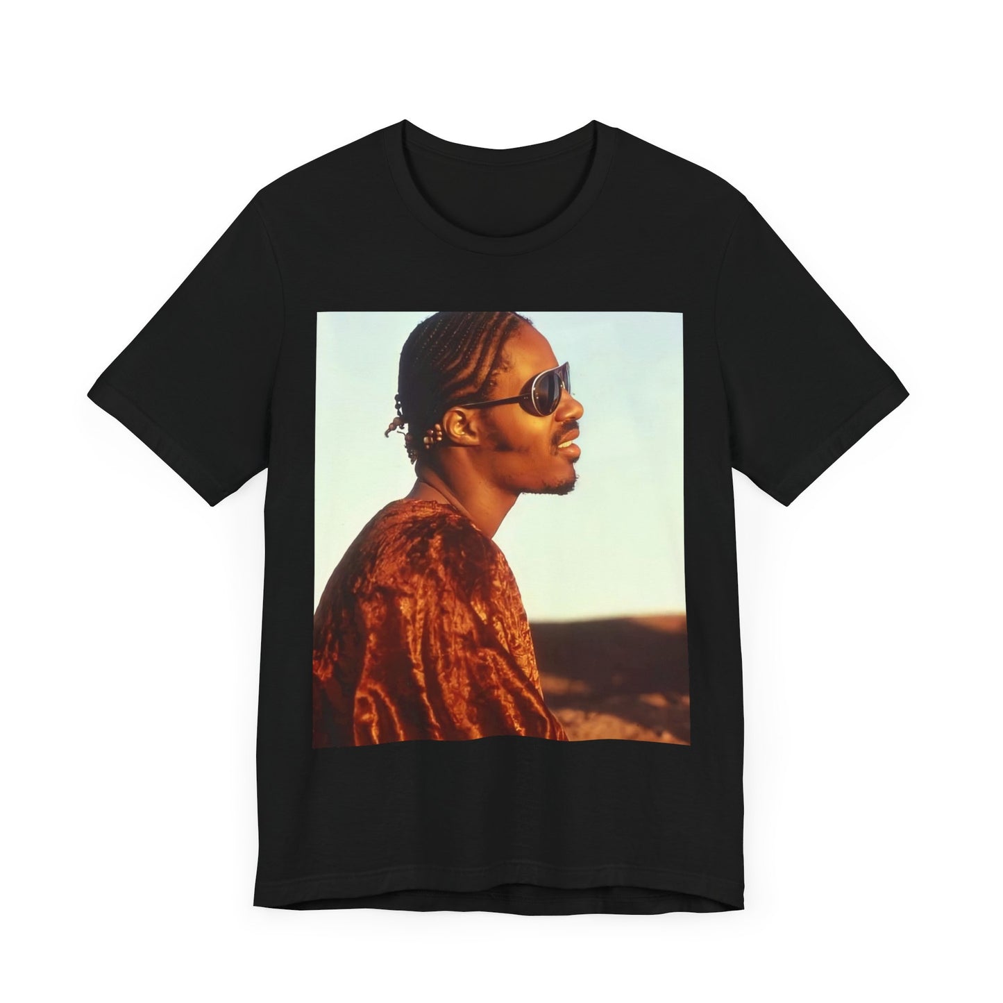 A black graphic t-shirt featuring a graphic of Stevie Wonder as an iconic style pop innovator.