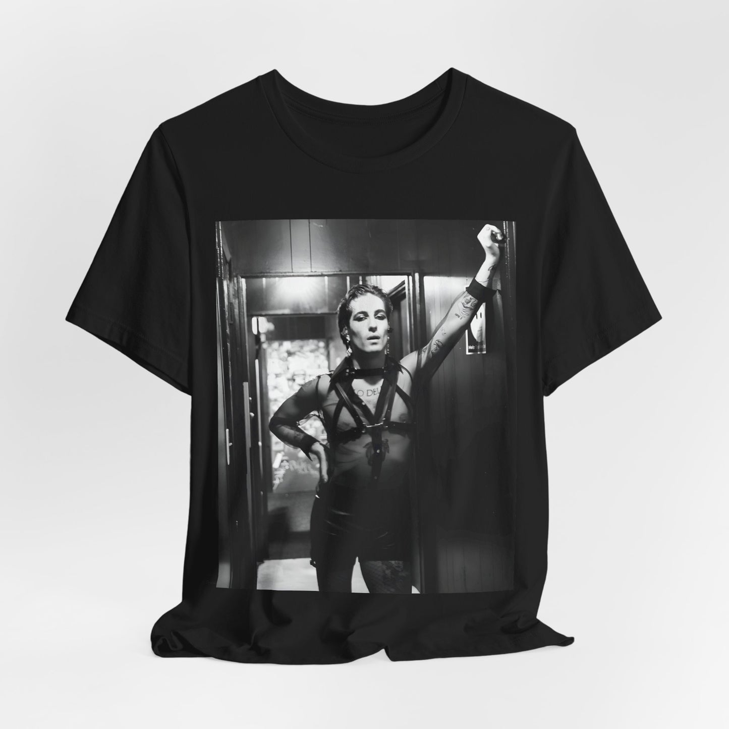 A black graphic t-shirt featuring a graphic of Maneskin emphasizing a rebel rock spirit.