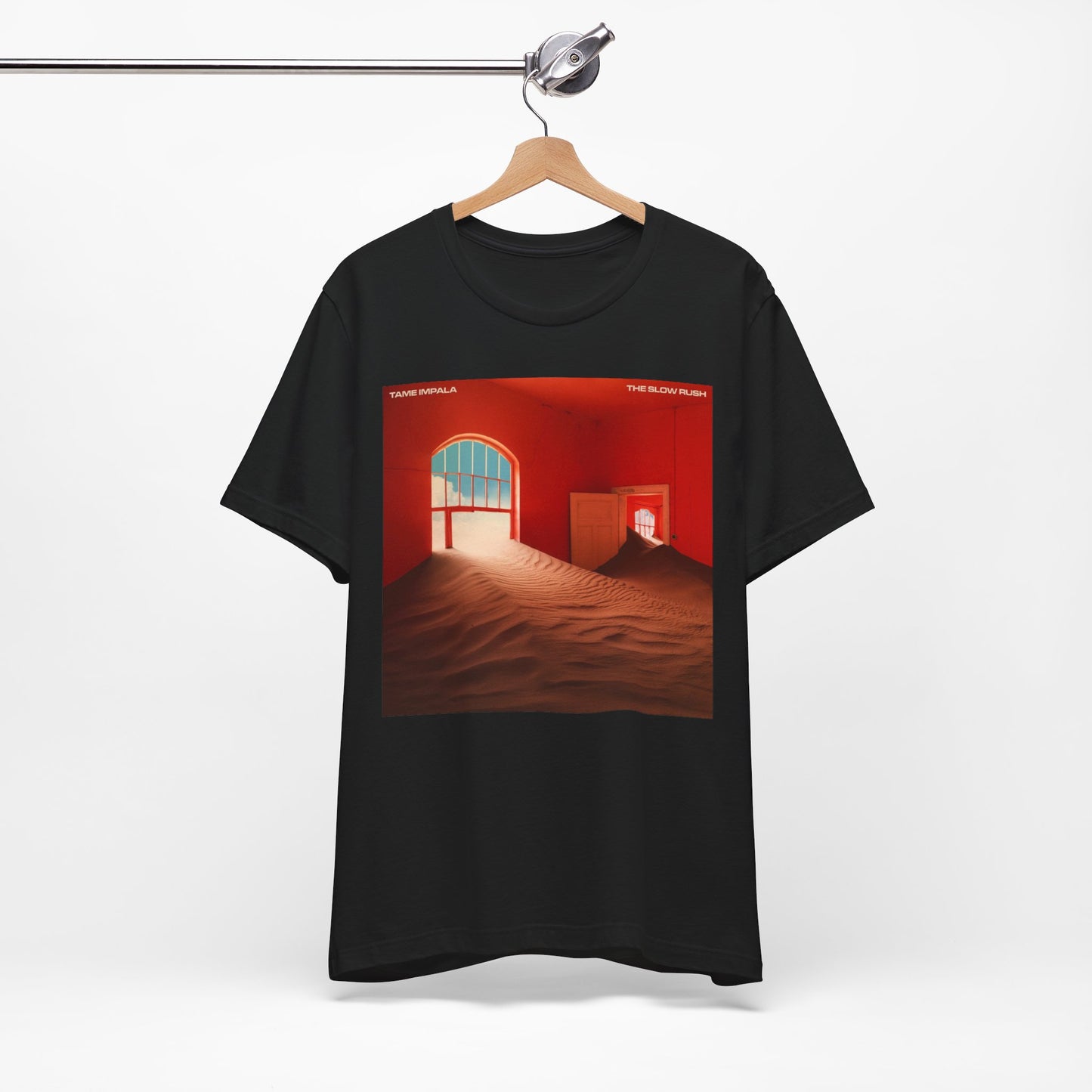 A black graphic t-shirt featuring a graphic related to Tame Impala's 'The Slow Rush' album.