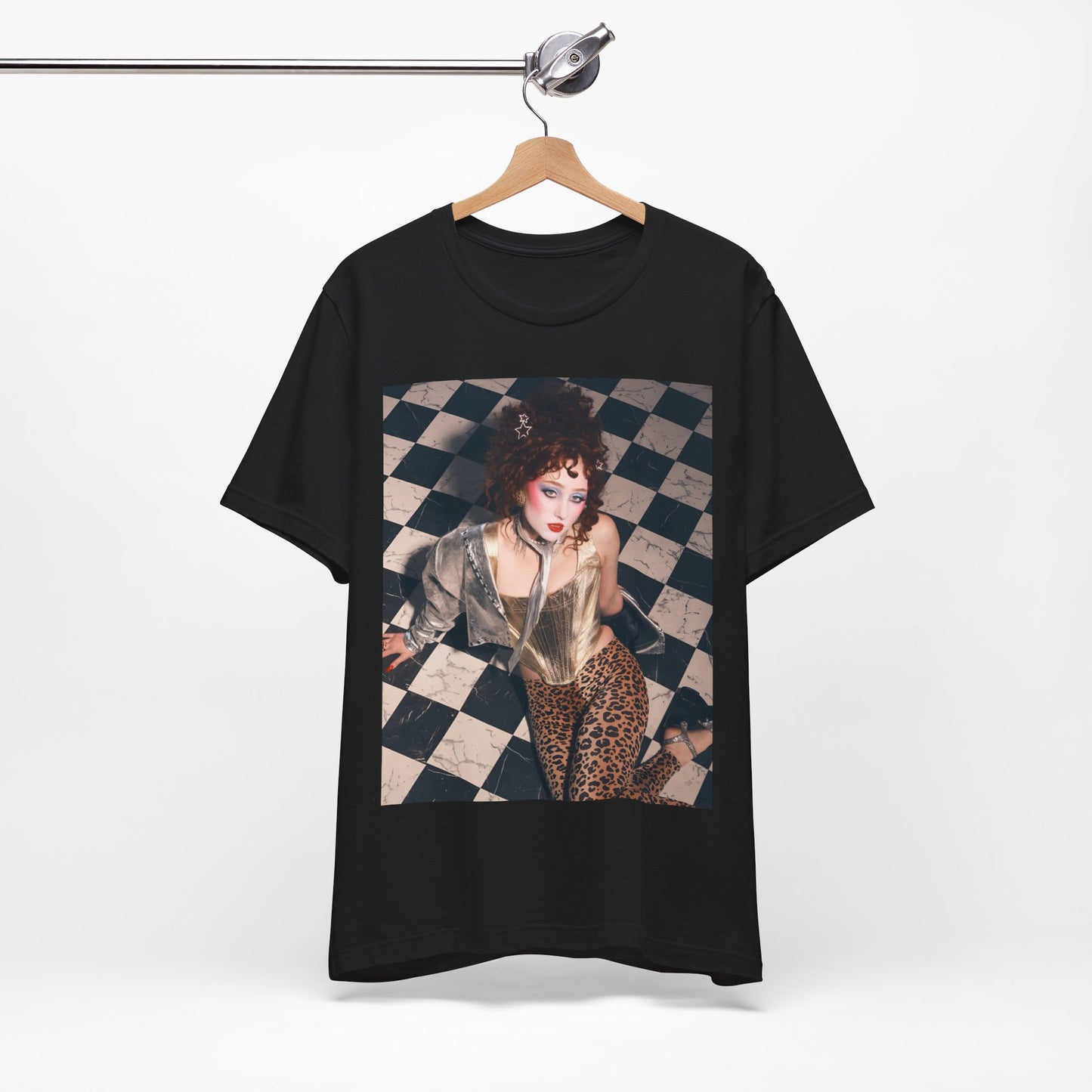 A black graphic t-shirt featuring a graphic of Chappell Roan, evoking "Naked in Manhattan" vibes.