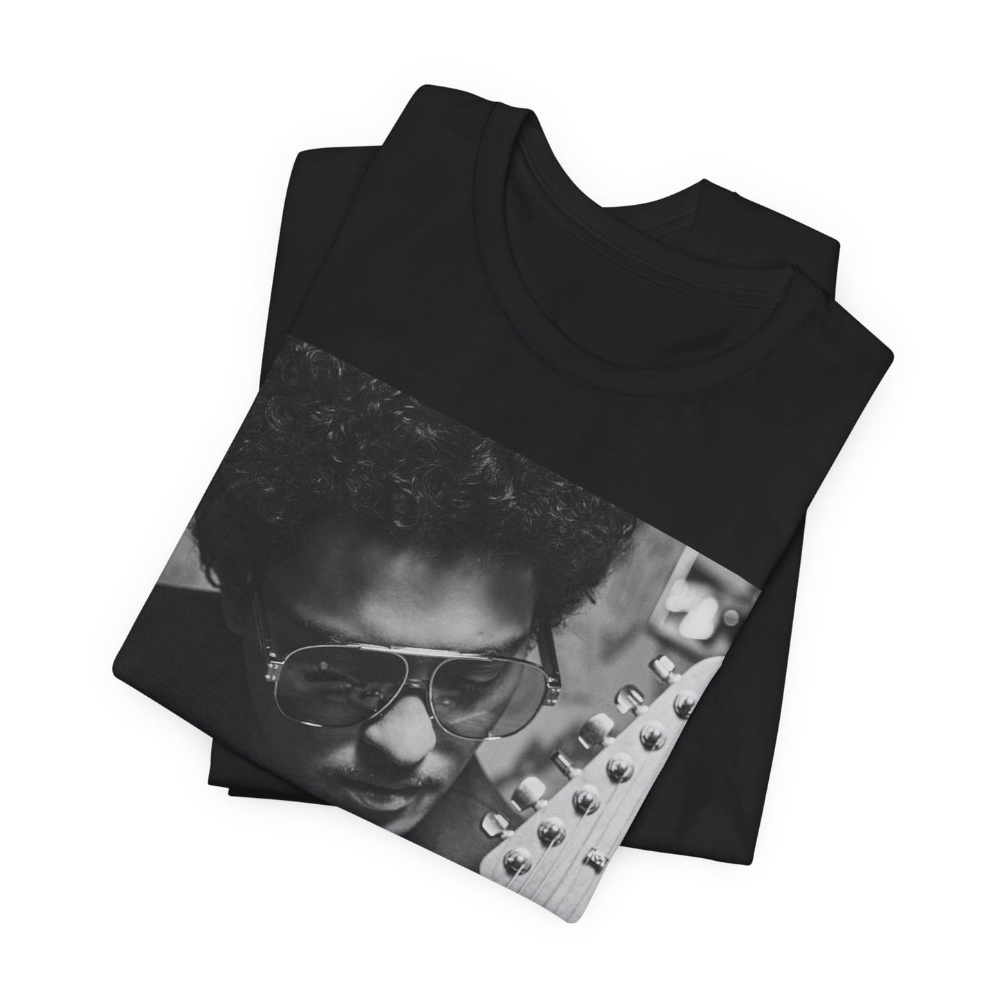 A black graphic t-shirt featuring a graphic of Bruno Mars in a classic crooner style.