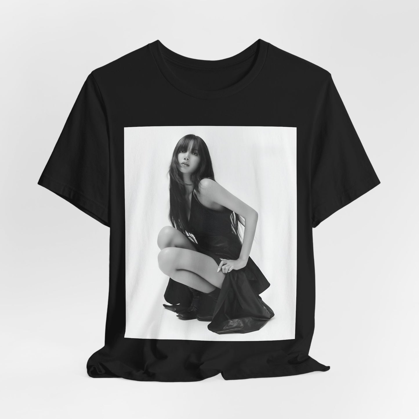 A black graphic t-shirt featuring a graphic related to Lisa's 'Money' song era.