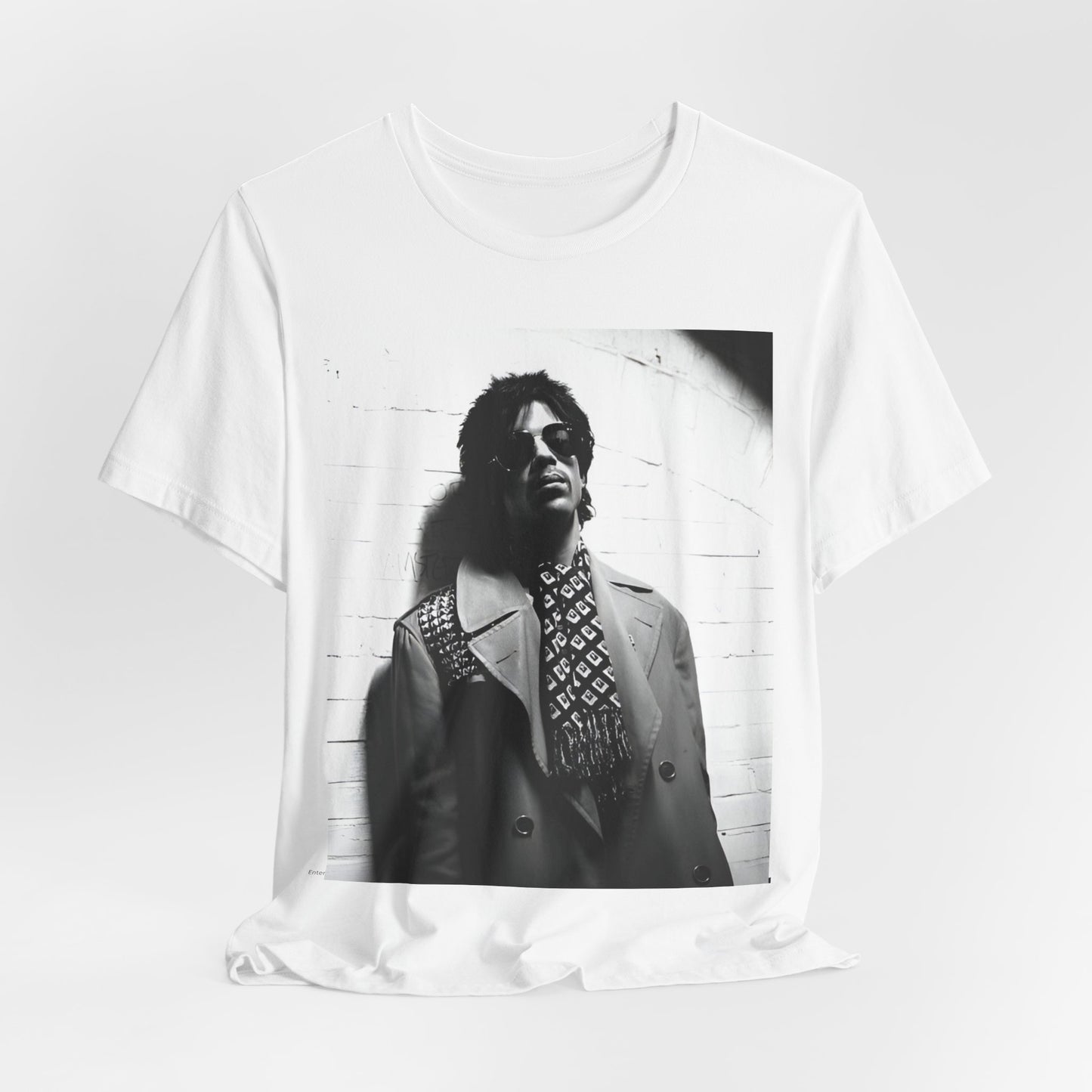 A black graphic t-shirt featuring Prince's iconic symbol, representing 'The Artist Formerly Known As'.