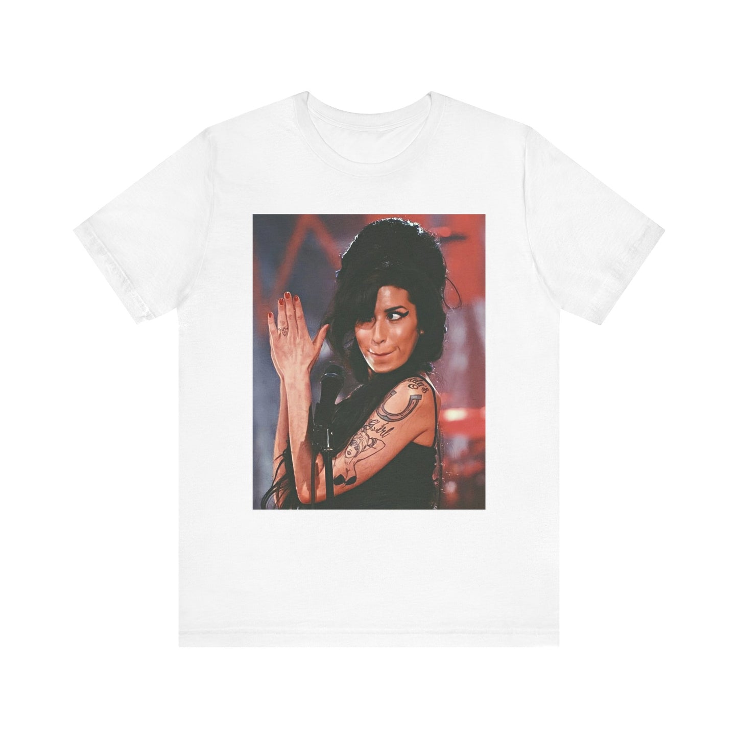 A black graphic t-shirt featuring a photo of Amy Winehouse performing live on stage in 2008, with her signature beehive and expressive singing.