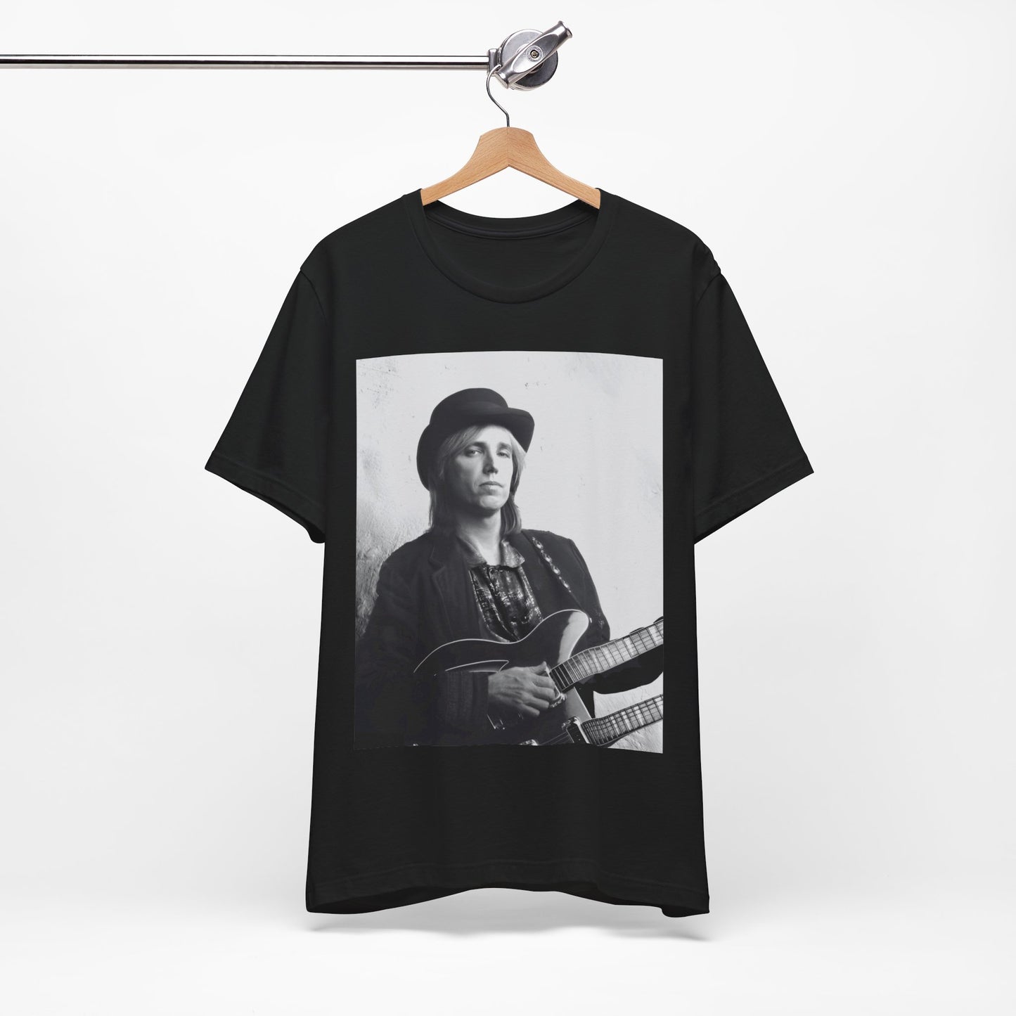 A black graphic t-shirt featuring a graphic related to Tom Petty's 'Wildflowers' album era.