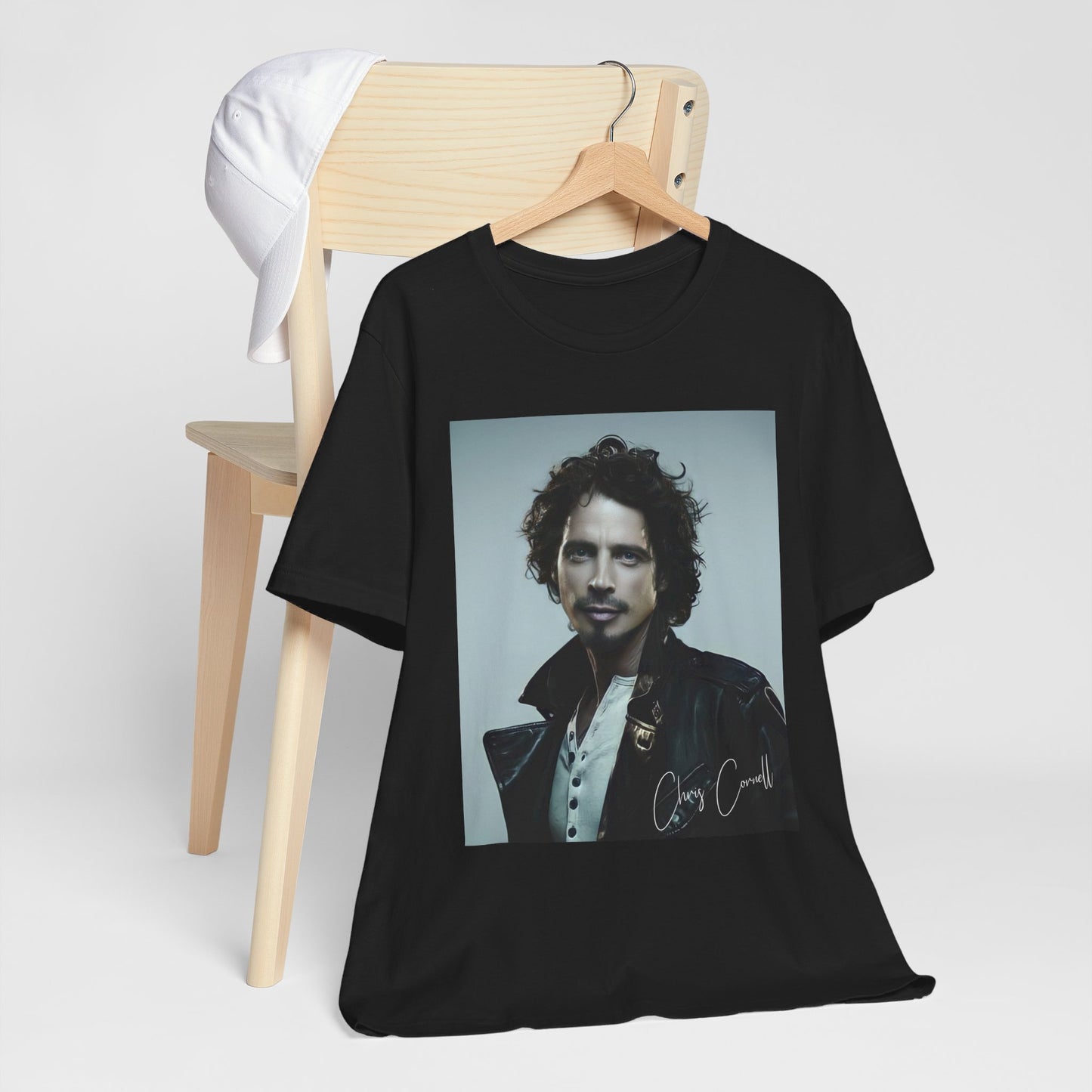 A black graphic t-shirt featuring a graphic related to Chris Cornell's song 'Like a Stone'.