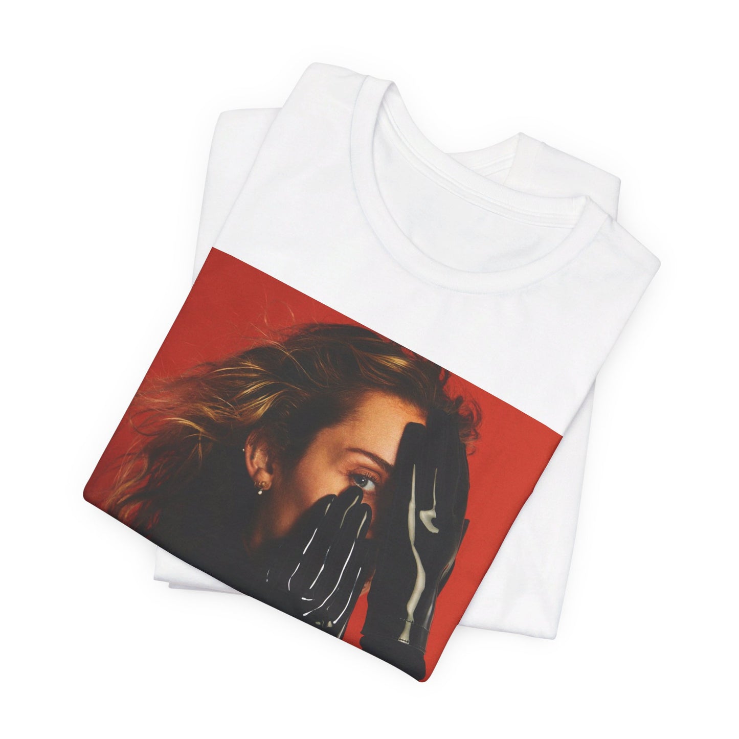A black graphic t-shirt featuring a graphic of Miley Cyrus with Nashville or country music elements.